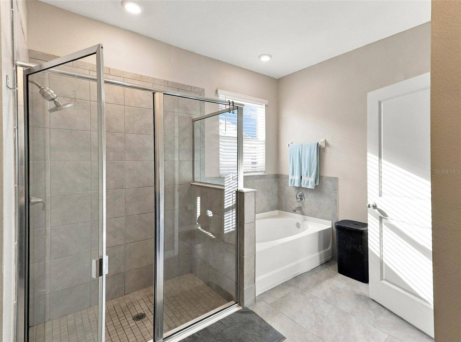 33310 MAJOR OAK DRIVE, Wesley Chapel, FL 33545 Primary Bathroom Featuring Glass-Enclosed Walk-In Shower