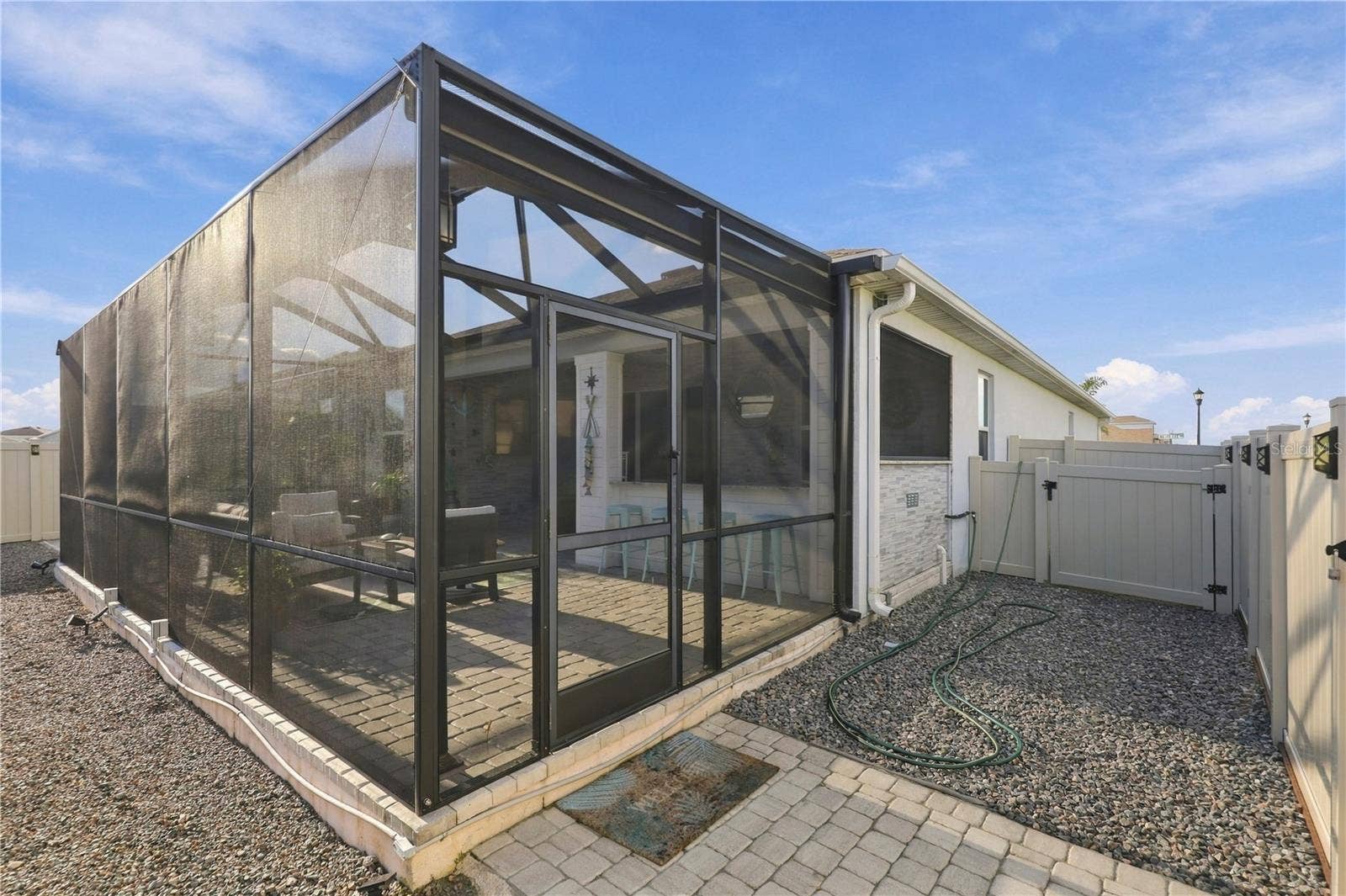 33310 MAJOR OAK DRIVE, Wesley Chapel, FL 33545 Screened Patio Spacious screened-in outdoor living area