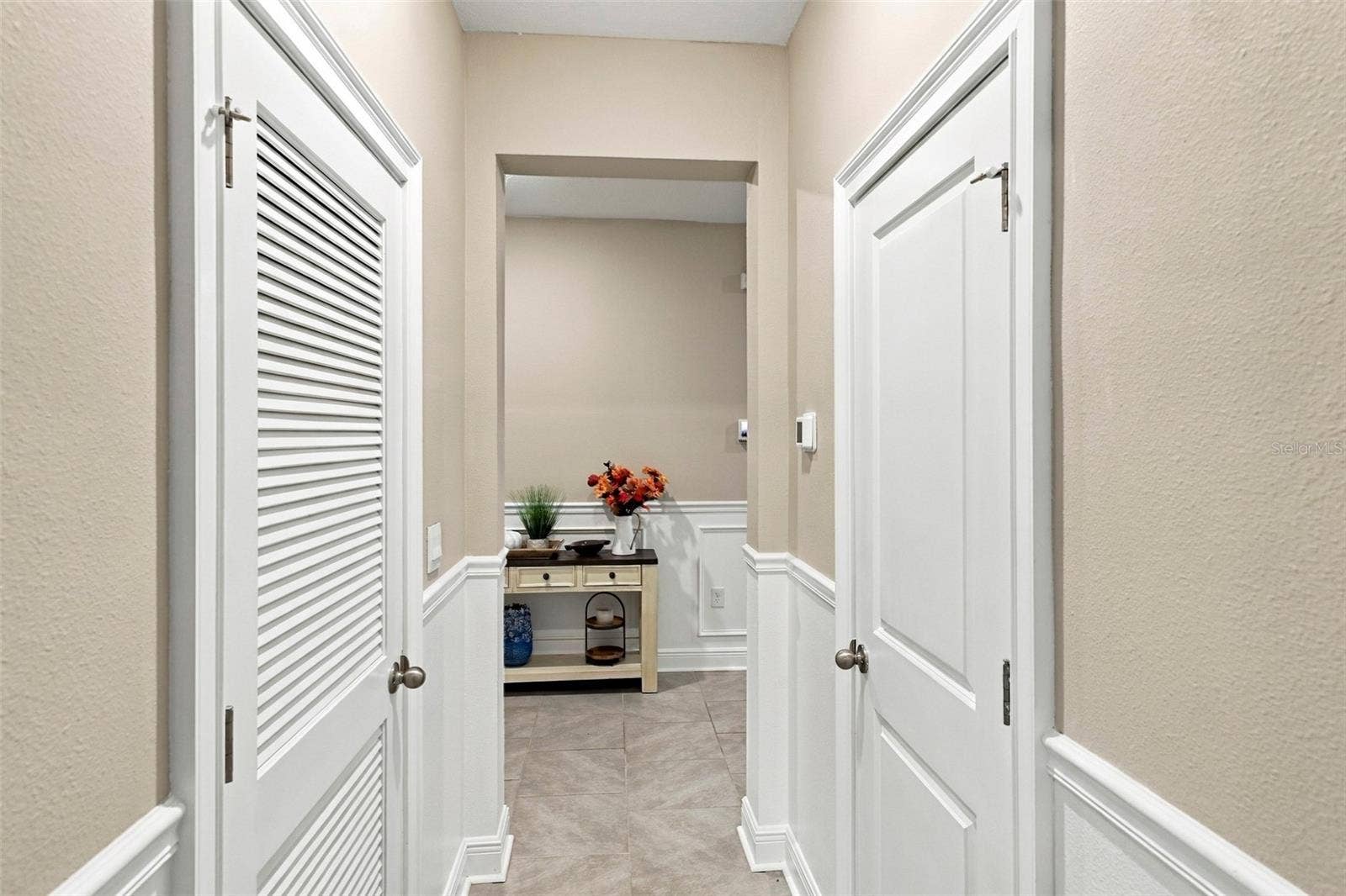 33310 MAJOR OAK DRIVE, Wesley Chapel, FL 33545 Beautiful Hallway Featuring Decorative Wall Molding and Tile Floor