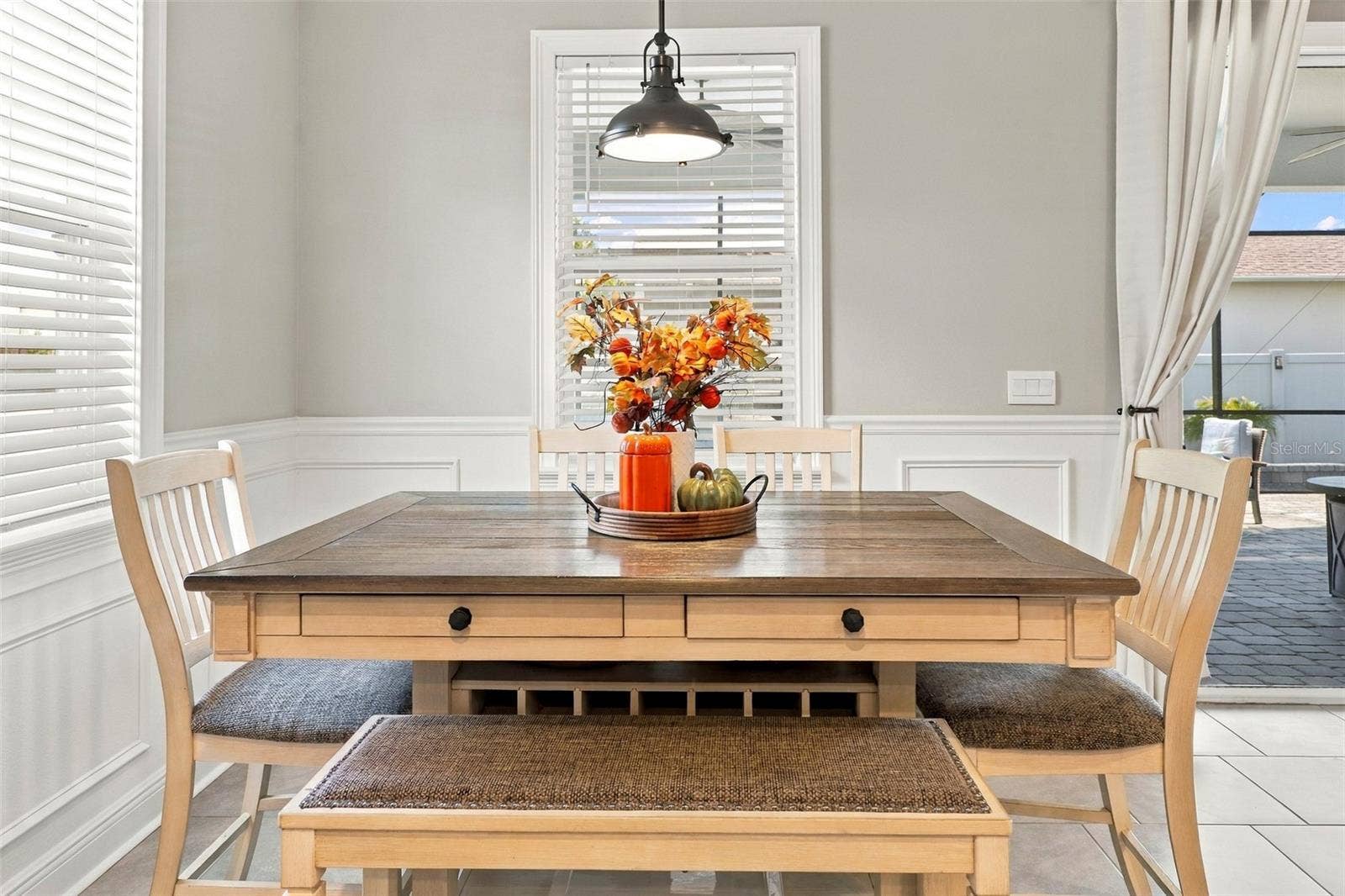 33310 MAJOR OAK DRIVE, Wesley Chapel, FL 33545 Charming Dining Area with Decorative Pendant Lighting
