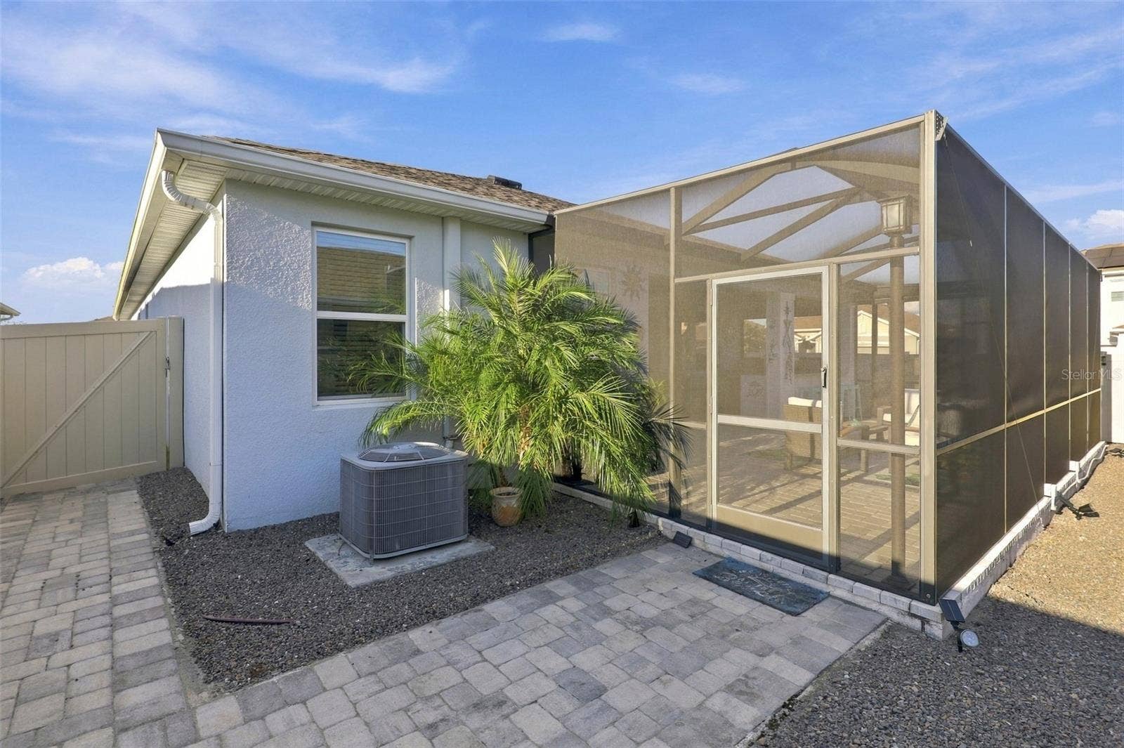 33310 MAJOR OAK DRIVE, Wesley Chapel, FL 33545 Expansive Screen-Enclosed Patio with Outdoor Entertaining Space
