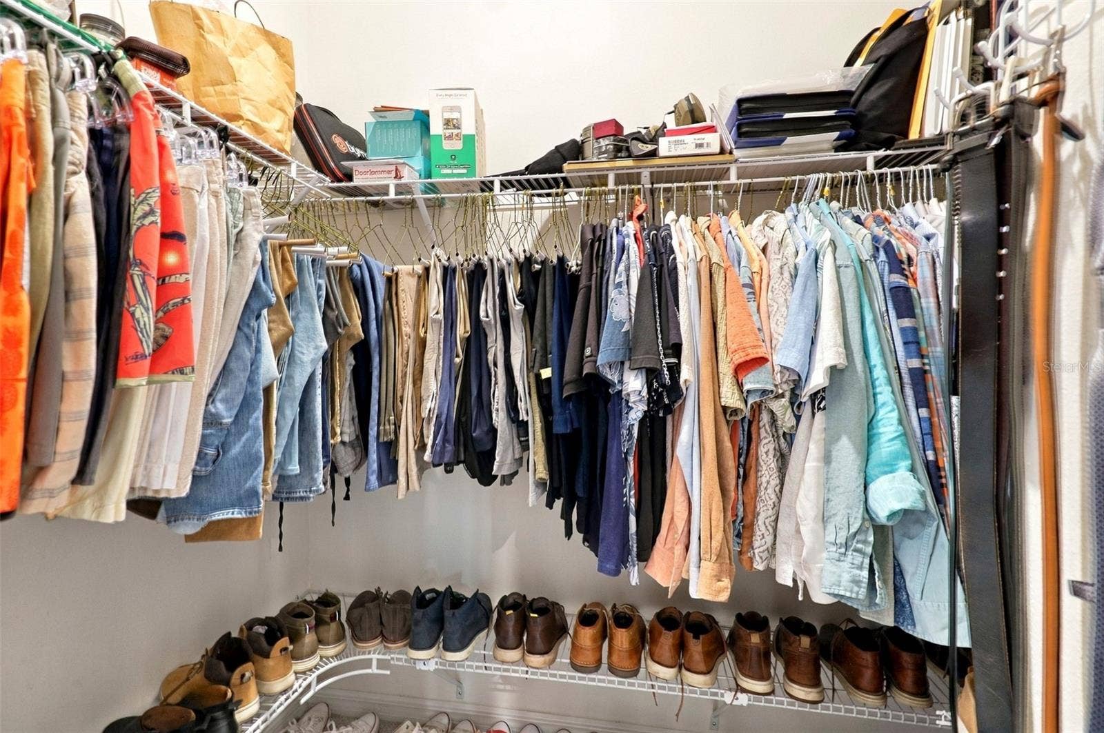 33310 MAJOR OAK DRIVE, Wesley Chapel, FL 33545 Spacious Walk-In Closet For Him with Built-In Shelving