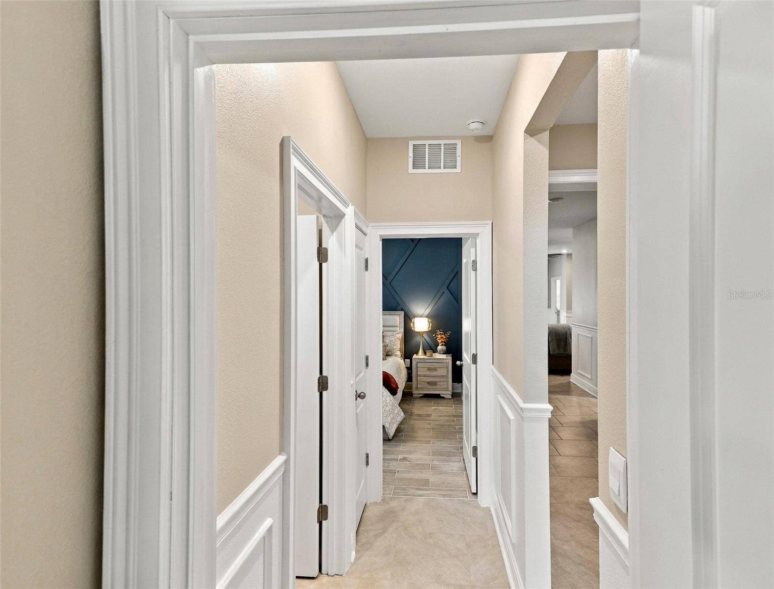 33310 MAJOR OAK DRIVE, Wesley Chapel, FL 33545 Beautiful Hallway Featuring Decorative Wall Molding and Tile Floor