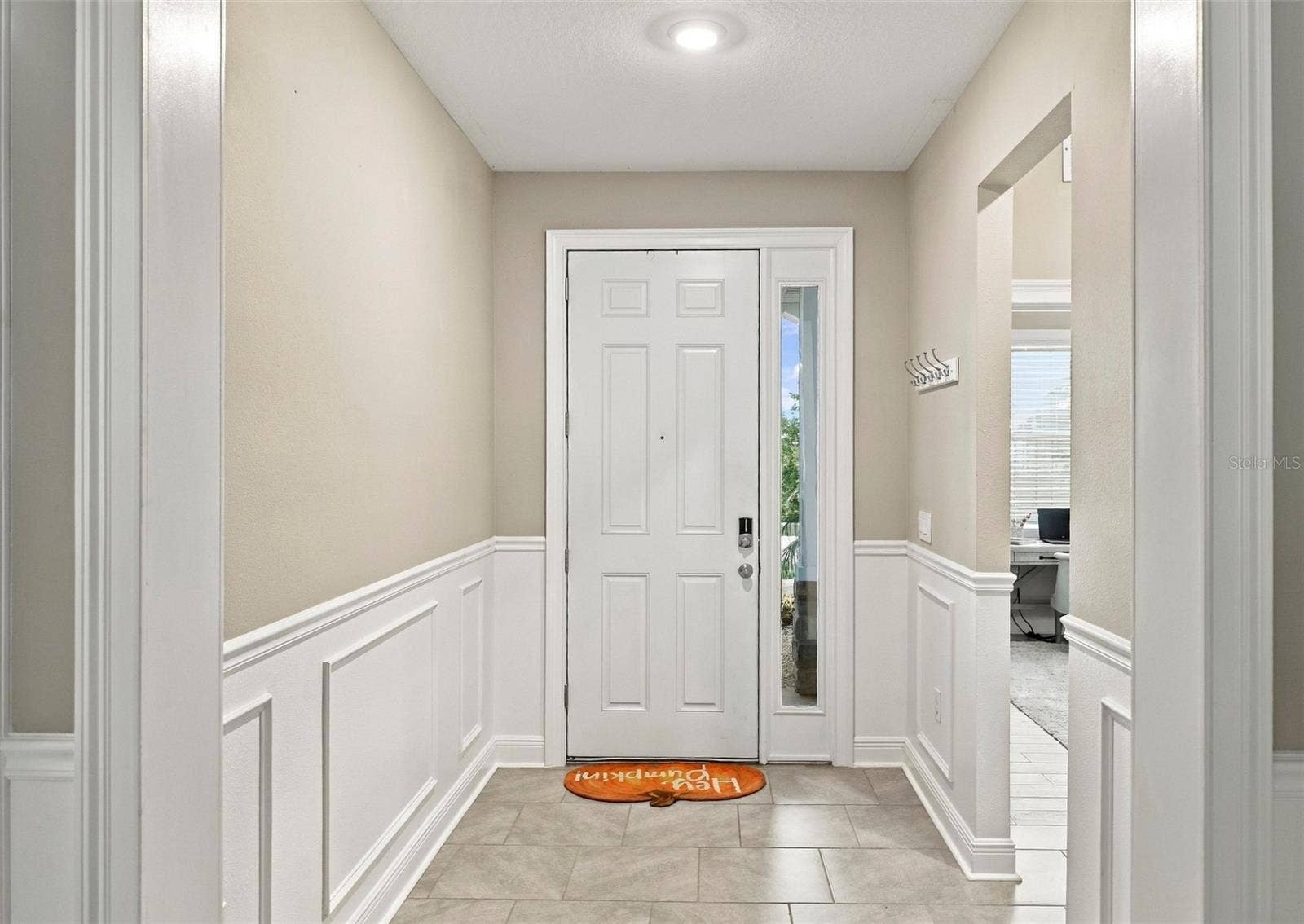 33310 MAJOR OAK DRIVE, Wesley Chapel, FL 33545 Foyer Featuring Elegant Wall Molding and Decorative trim
