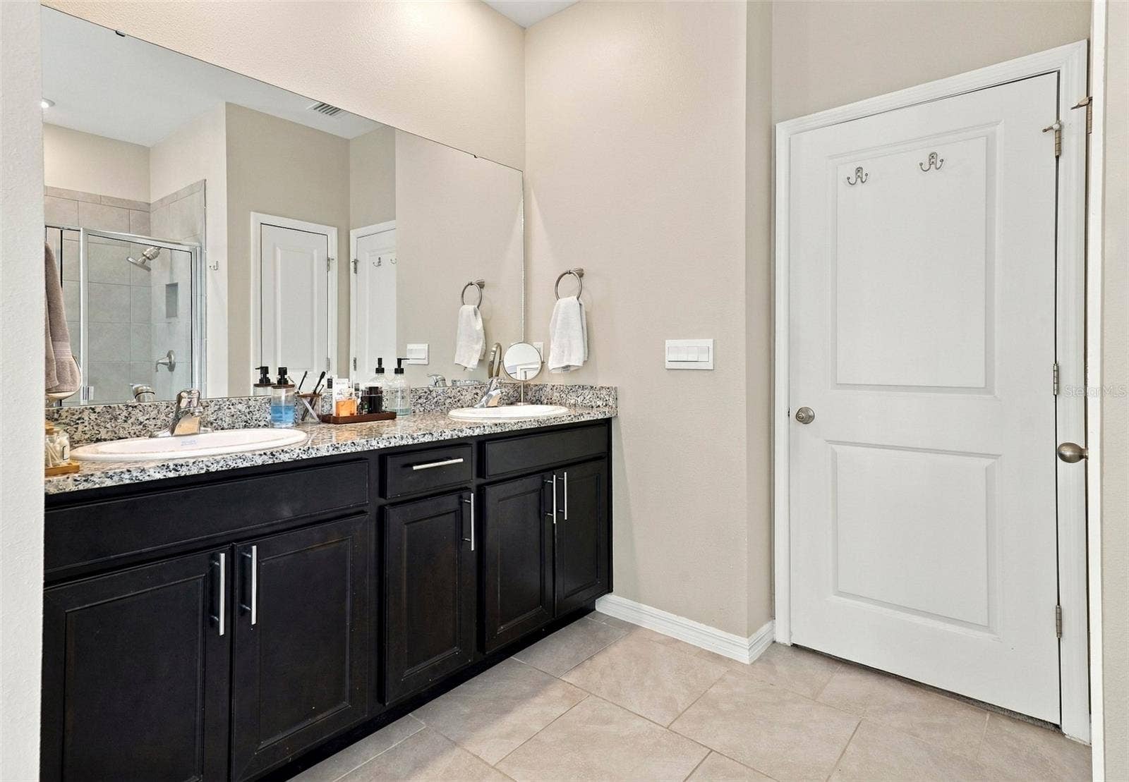 33310 MAJOR OAK DRIVE, Wesley Chapel, FL 33545 Primary Bathroom with Dual-Sink Vanity and Ample Cabinet Storage