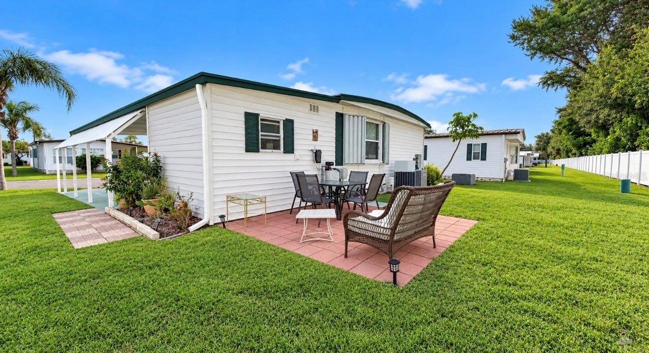 1100 BELCHER ROAD S, #350, Largo, FL 33771 Back patio on fence line
