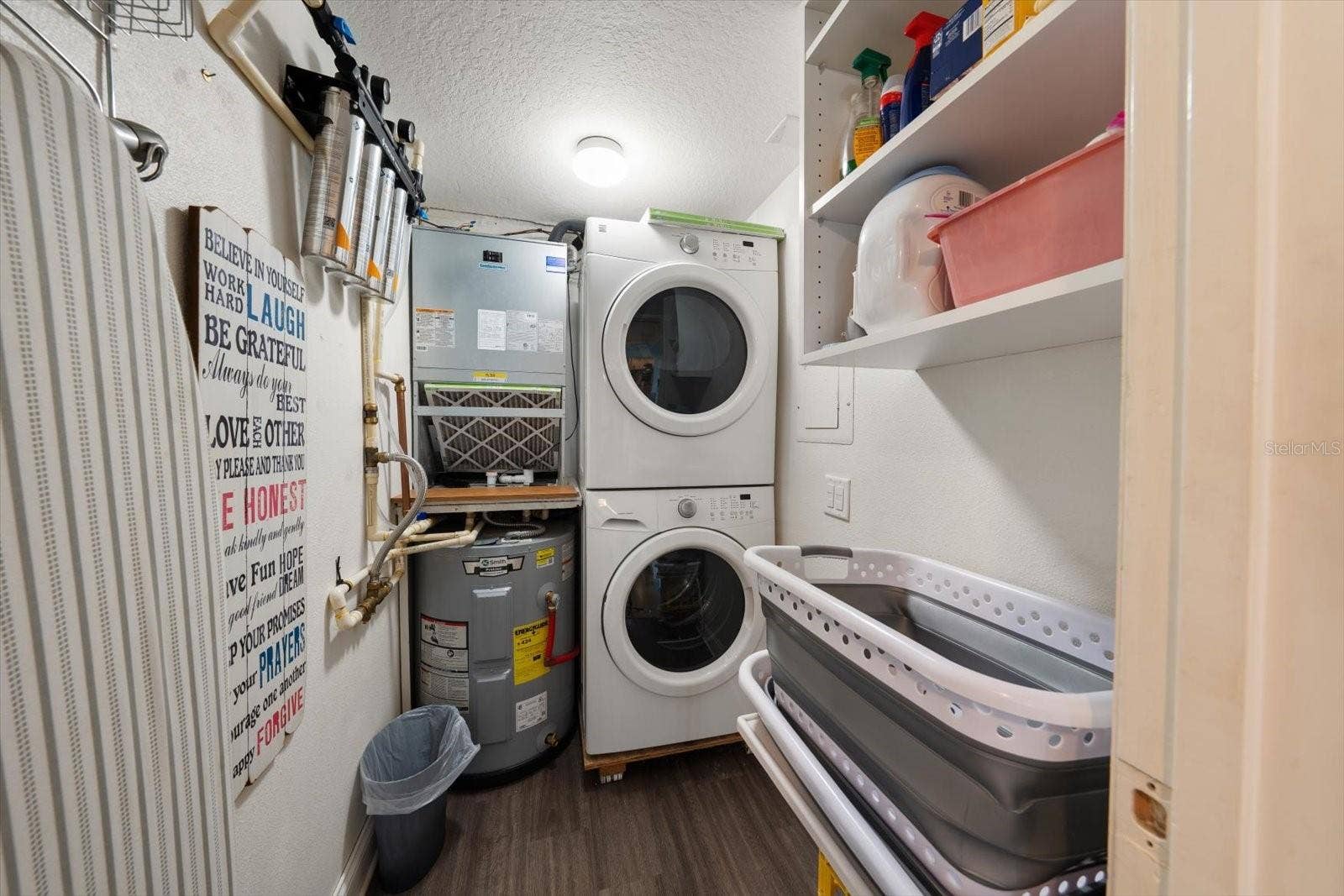 2700 BAYSHORE BOULEVARD, #11404, Dunedin, FL 34698 Inside laundry room with storage