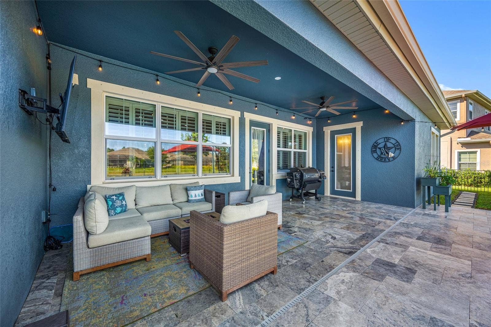 4161 GLADE WOOD LOOP, New Port Richey, FL 34655 Lanai with stone paver pool deck