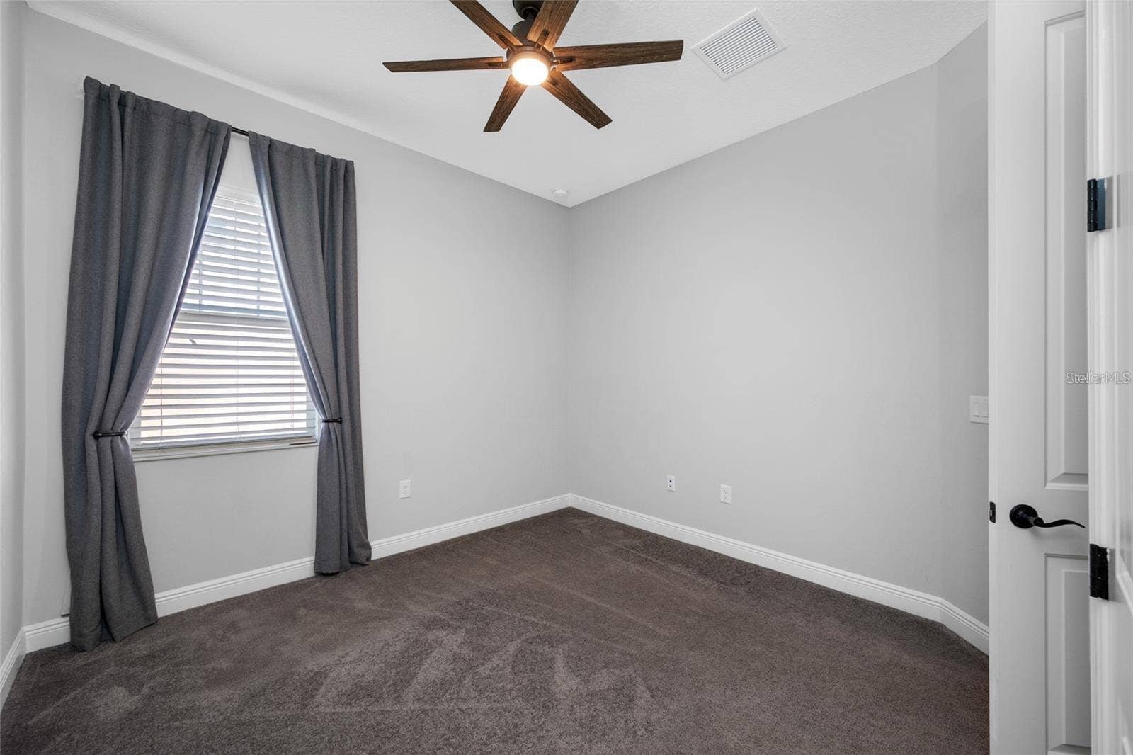 4161 GLADE WOOD LOOP, New Port Richey, FL 34655 Bedroom without virtual staging