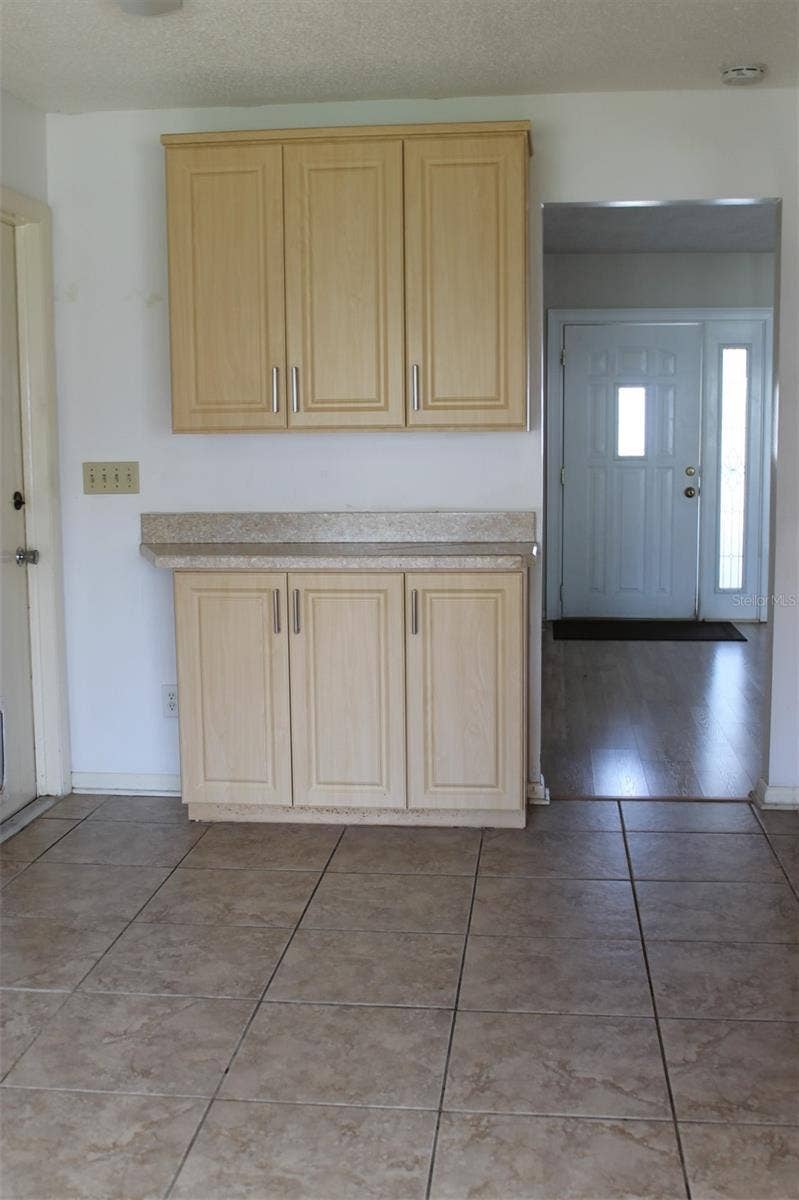 9510 45TH STREET N, Pinellas Park, FL 33782 Cabinets in Eat-In Area of Kitchen