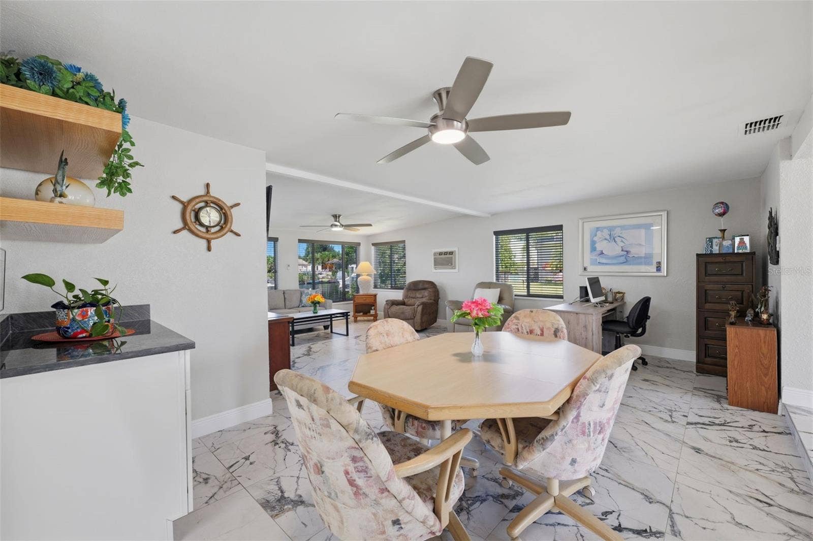 Updated ceiling fans.  No popcorn ceilings.  Updated ceiling textures through out