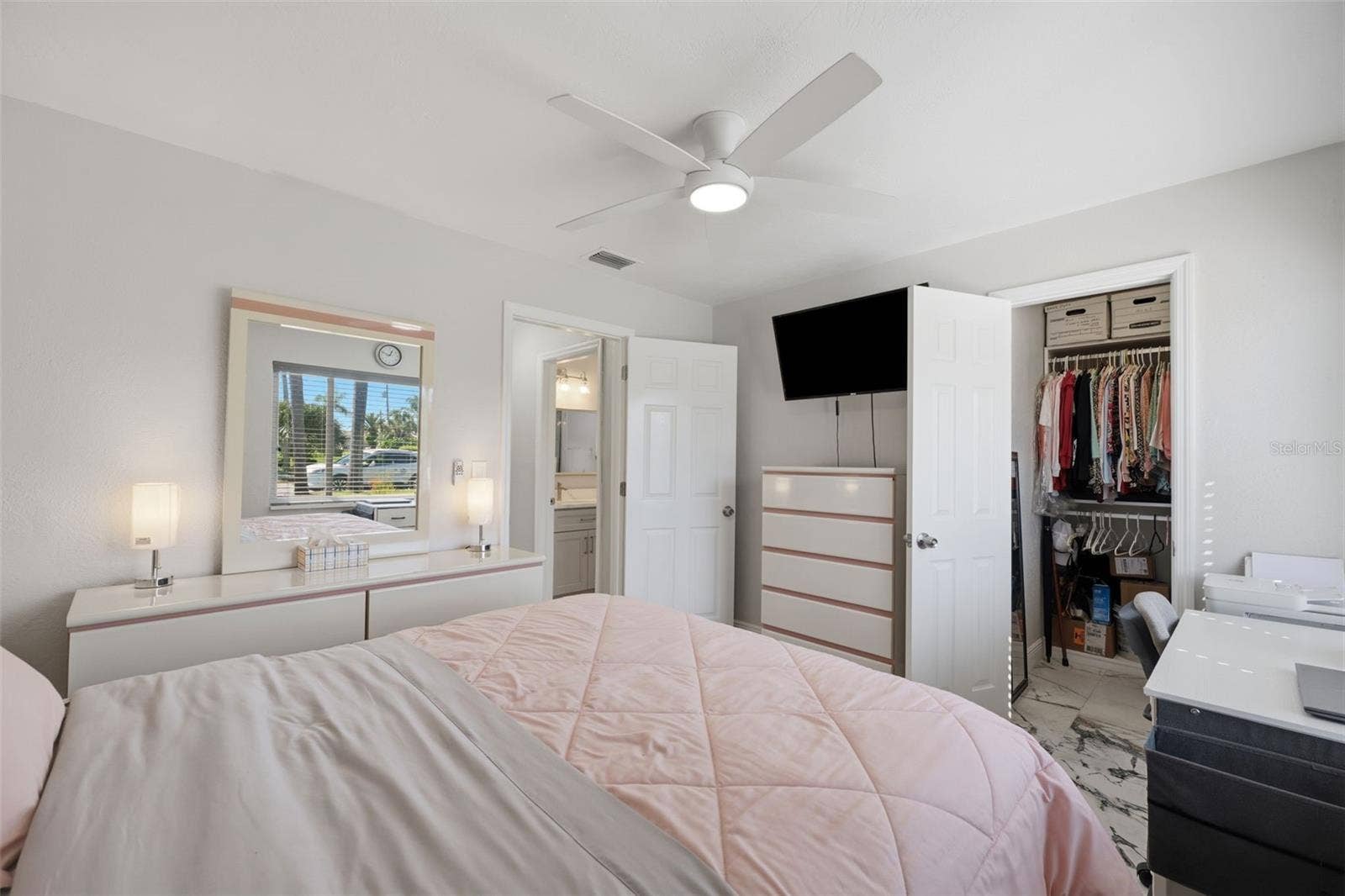 Guest bedroom with large custom closet