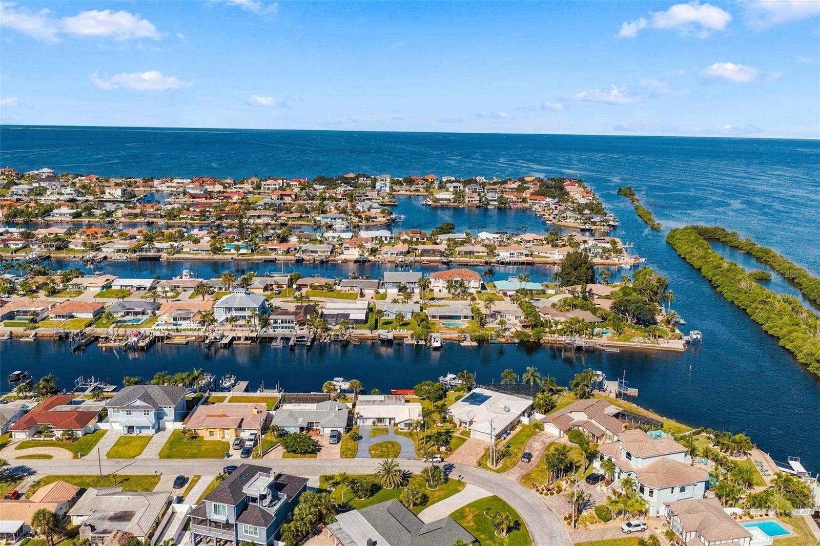 Circular drive for guest parking!  2 minutes or less to the wide open Gulf. Sunset views!