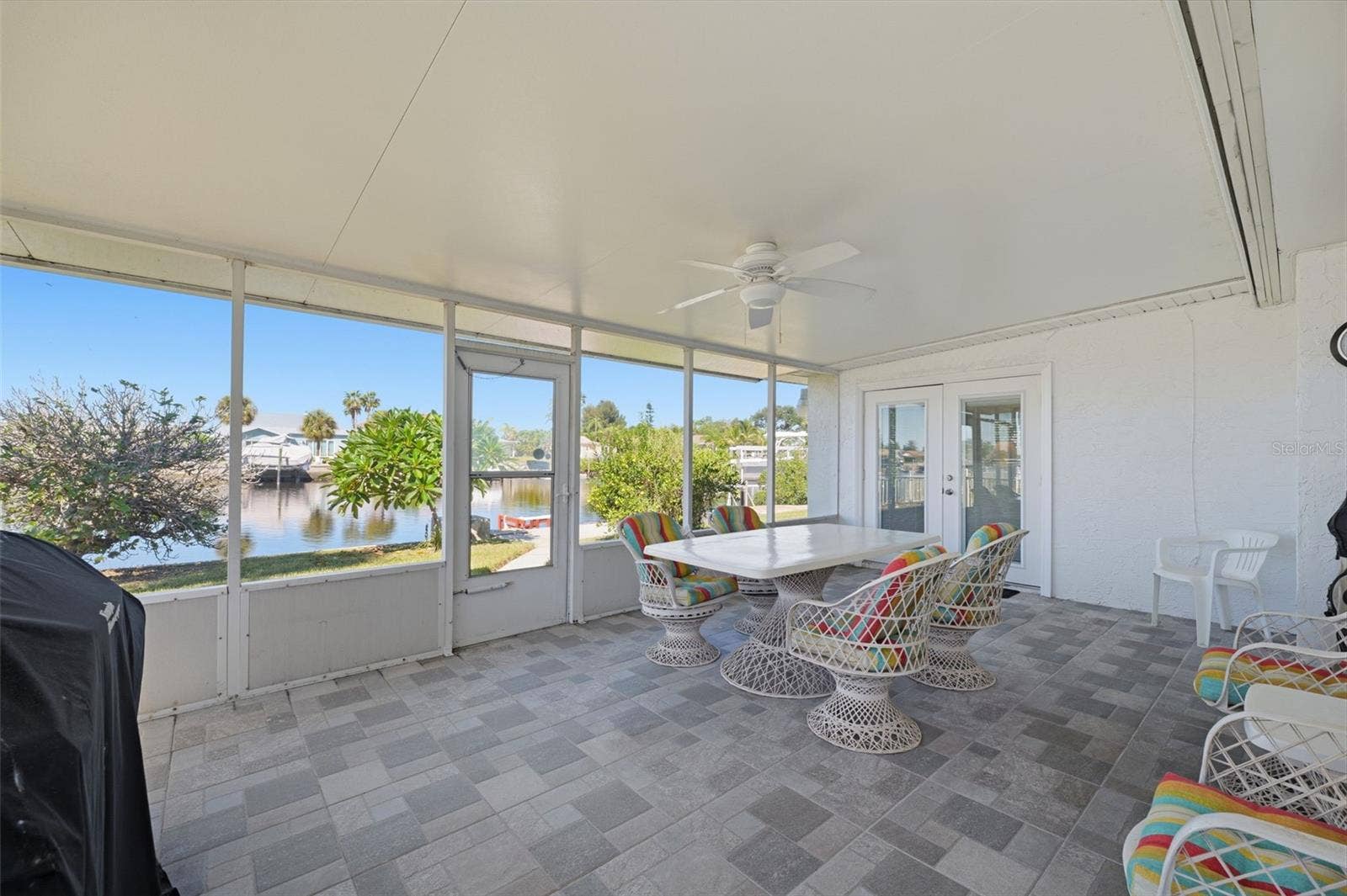 Large screened, enclosed FL room just off the family room. Water view & sunsets that humble the soul.