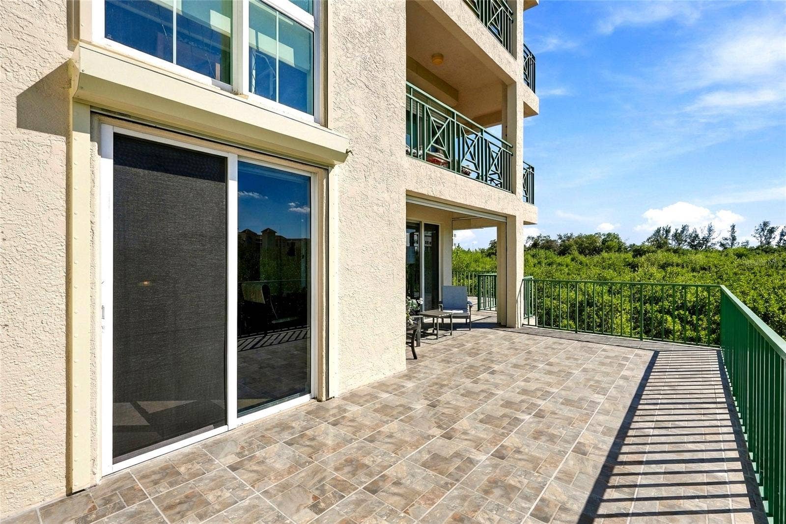 4780 DOLPHIN CAY LANE S, #102, St Petersburg, FL 33711 approx 1000 sf of outdoor space!