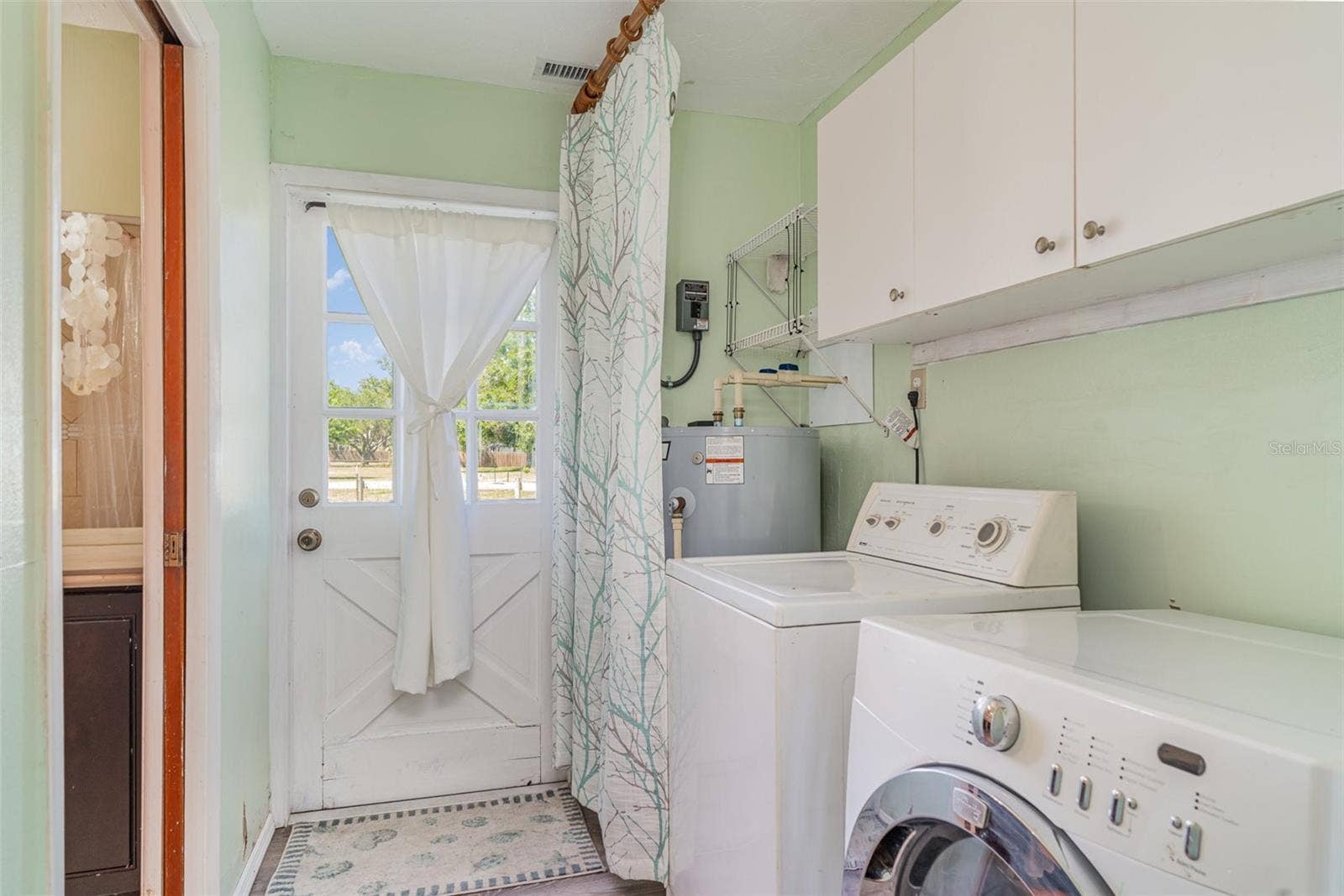 1305 GREENFIELD CIRCLE, Venice, FL 34292 Inside Laundry