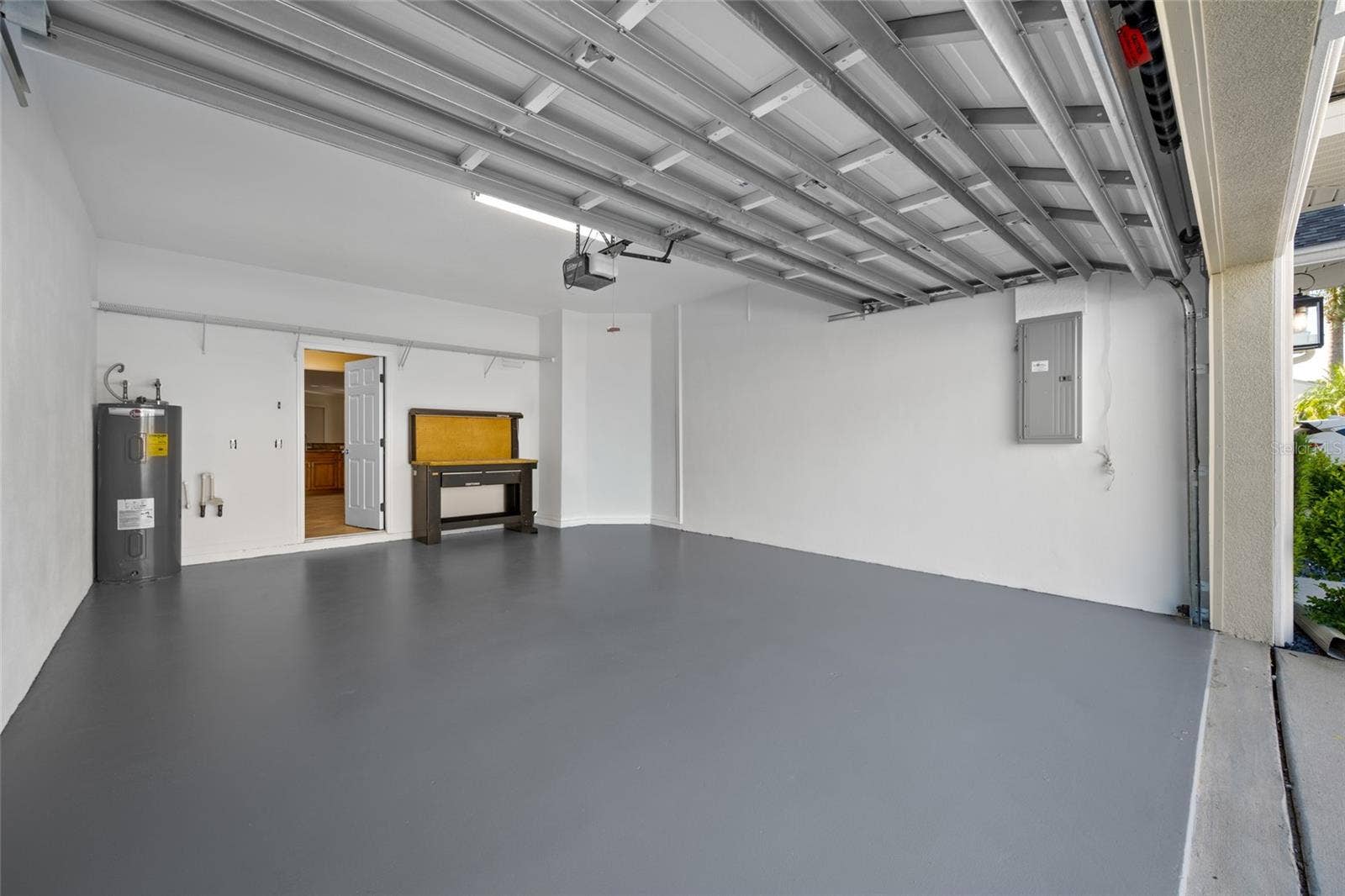 Freshly Painted Garage Walls, Ceiling & Floor!