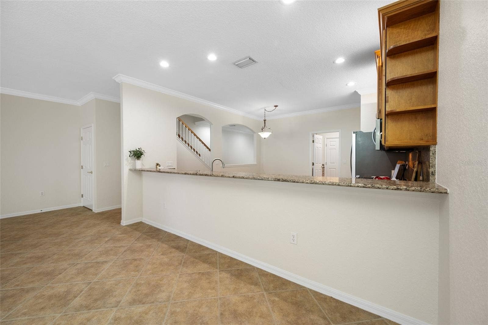 Long Breakfast Bar From Kitchen to Dining Rm!