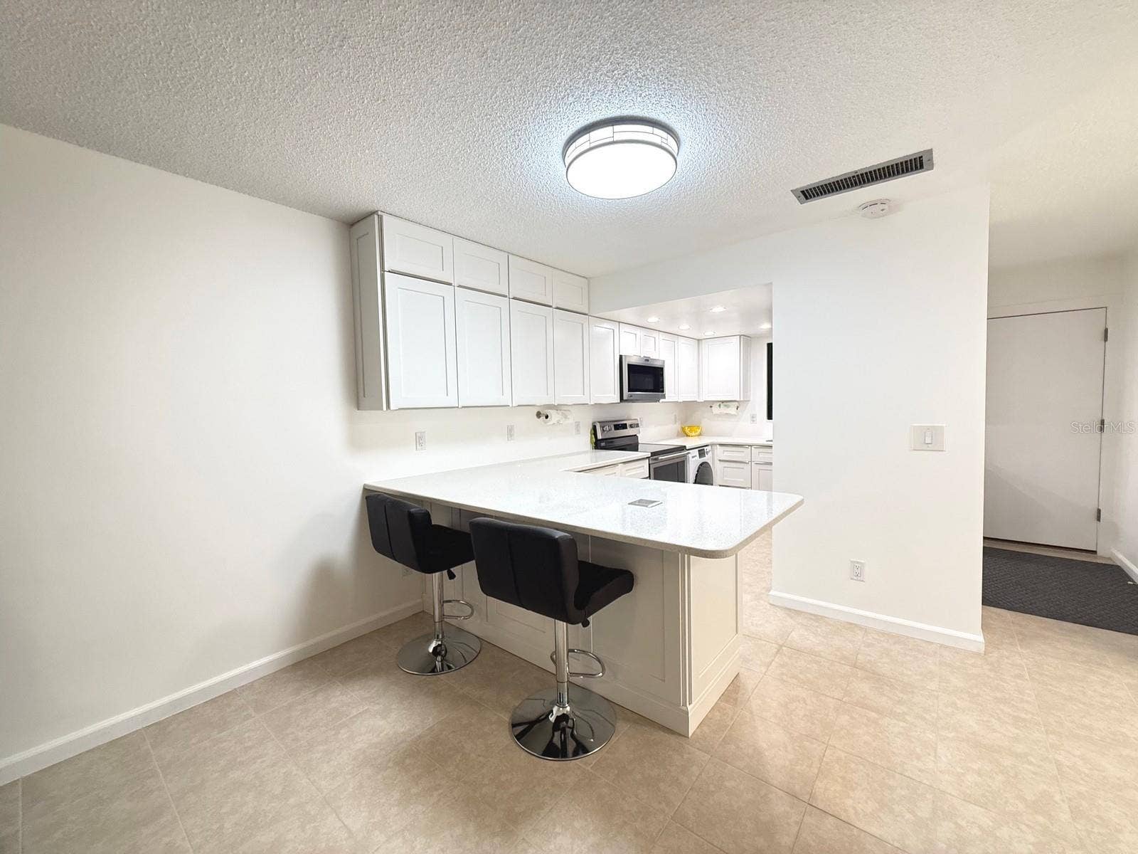 215 VALENCIA BOULEVARD, #107, Belleair Bluffs, FL 33770 UPDATED to PERFECTION