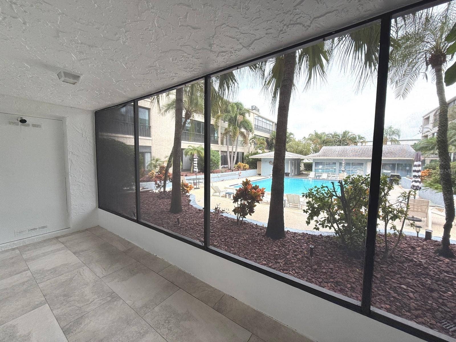 215 VALENCIA BOULEVARD, #107, Belleair Bluffs, FL 33770 POOL and GARDEN VIEW