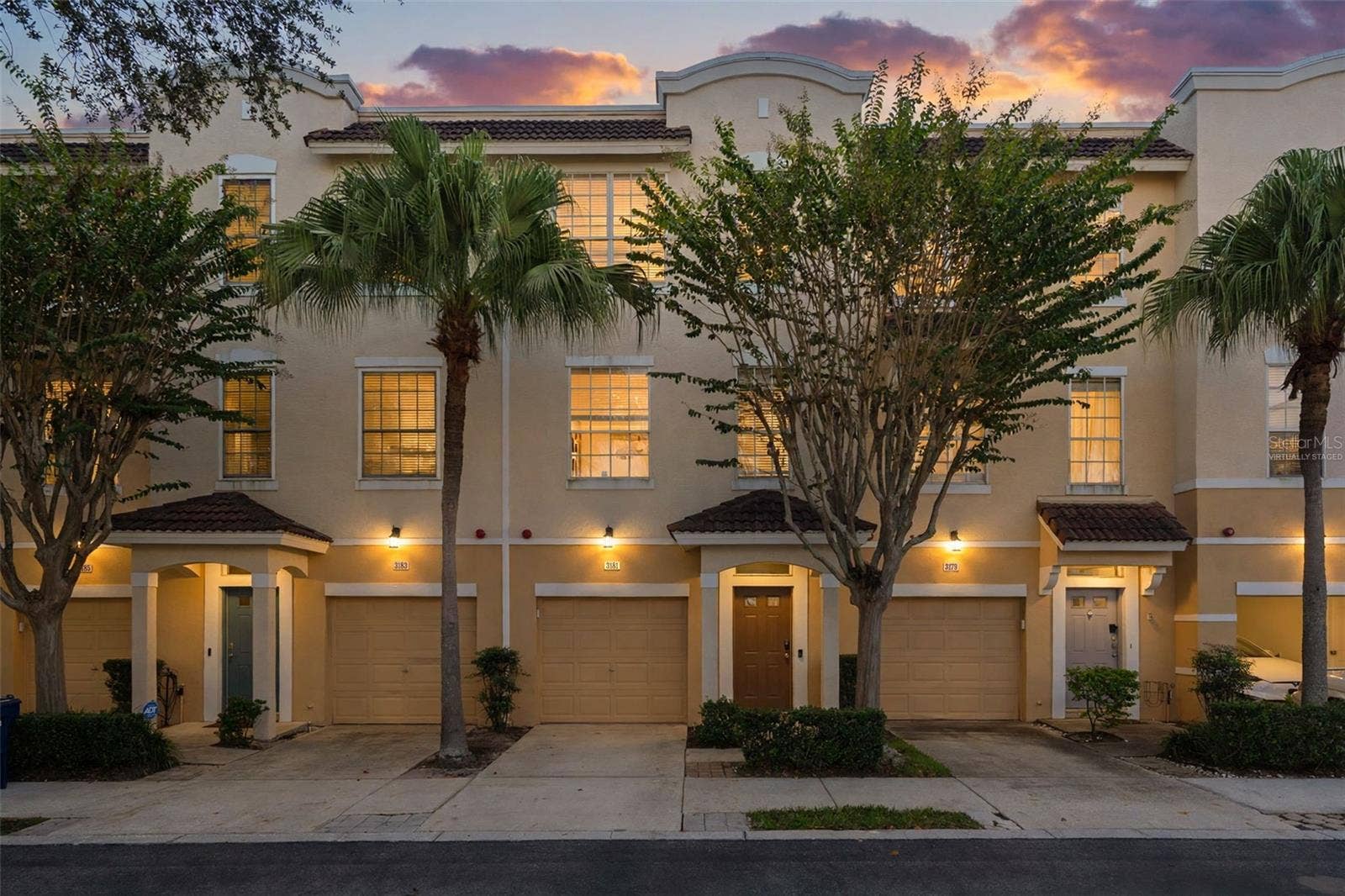 3181 BAYSHORE OAKS DRIVE, Tampa, FL 33611 Front exterior - virtually staged twilight (digitally altered sky and lighting)
