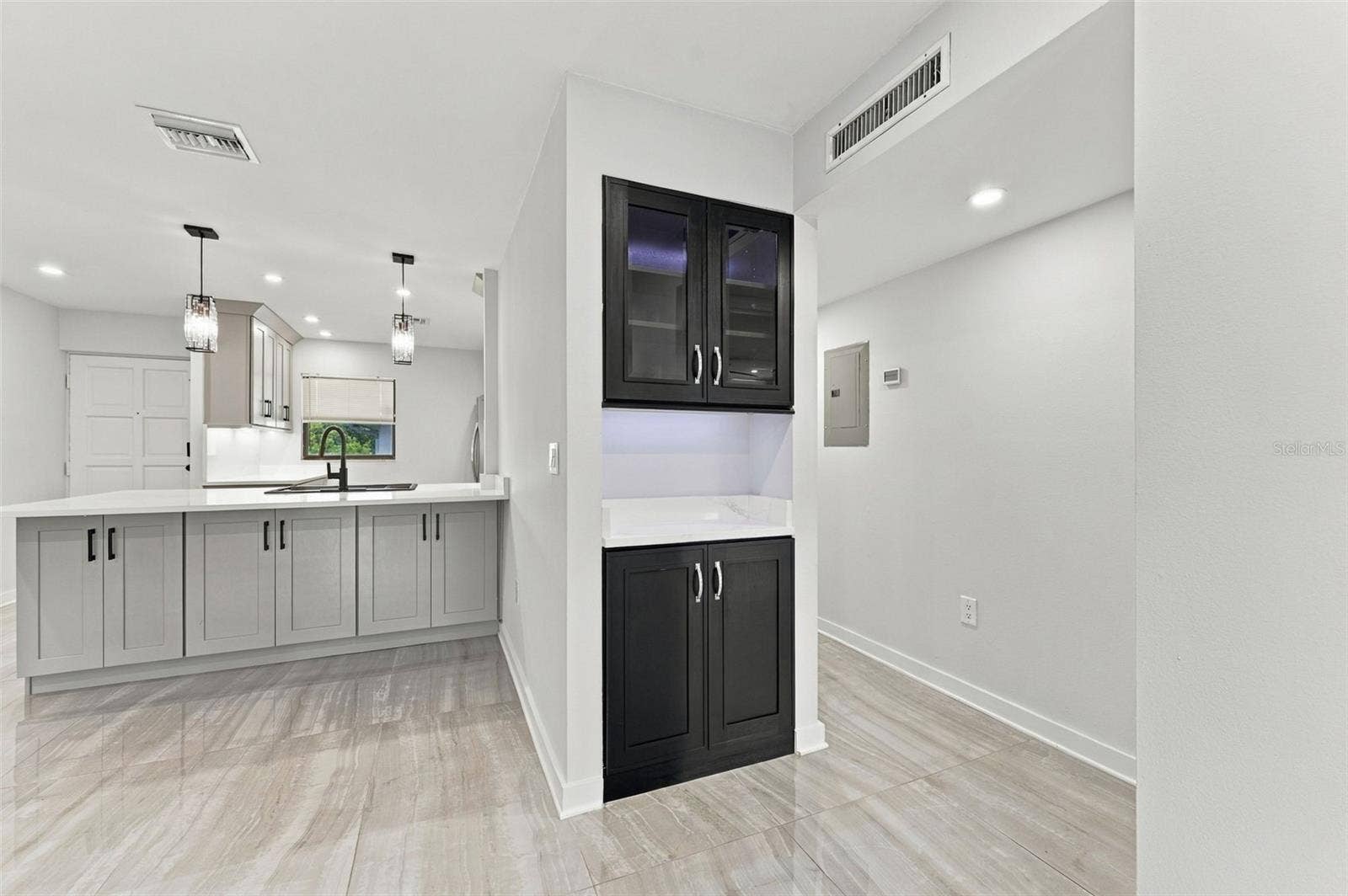 Built-in dry bar adds style, storage and extra entertaining space