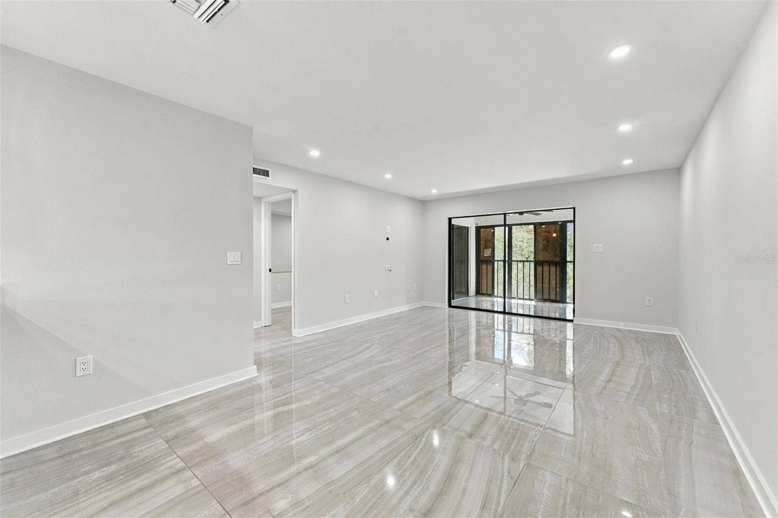 Dining area flows seamlessly into the inviting living room