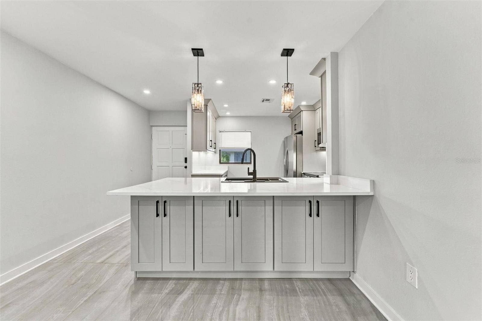 Bar seating in kitchen with additional under counter storage