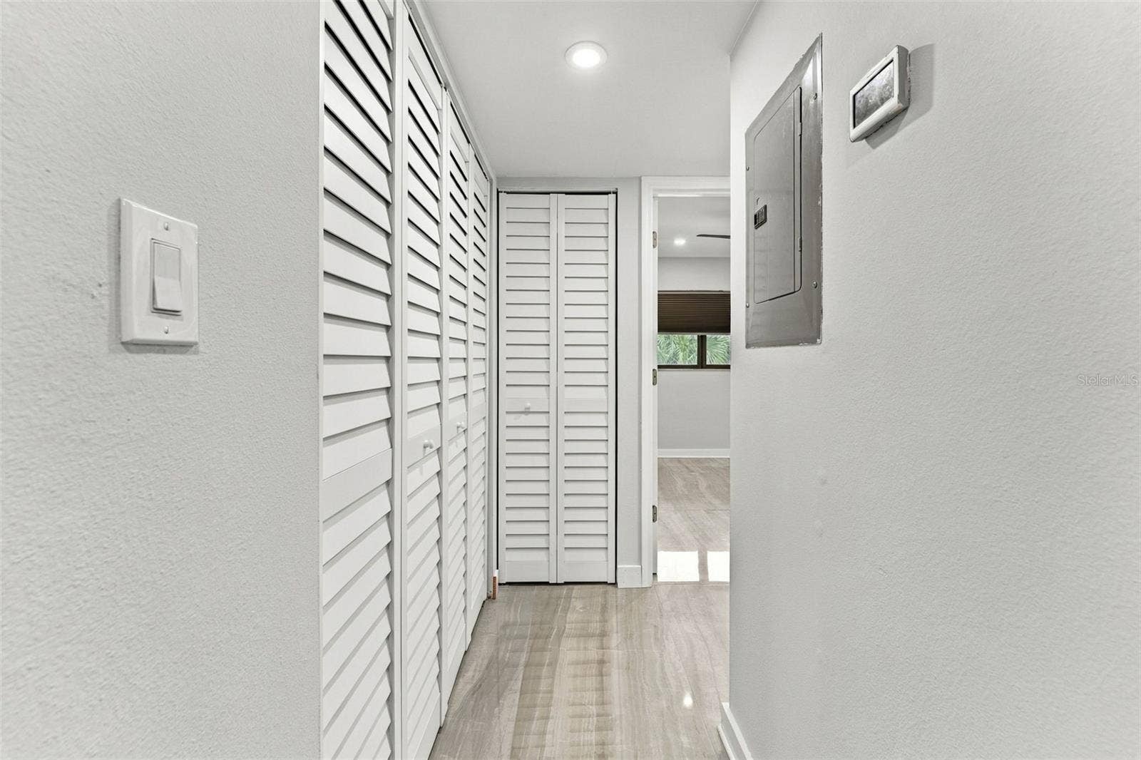 Hallway leading to bedroom two and the beautifully remodeled hall bathroom