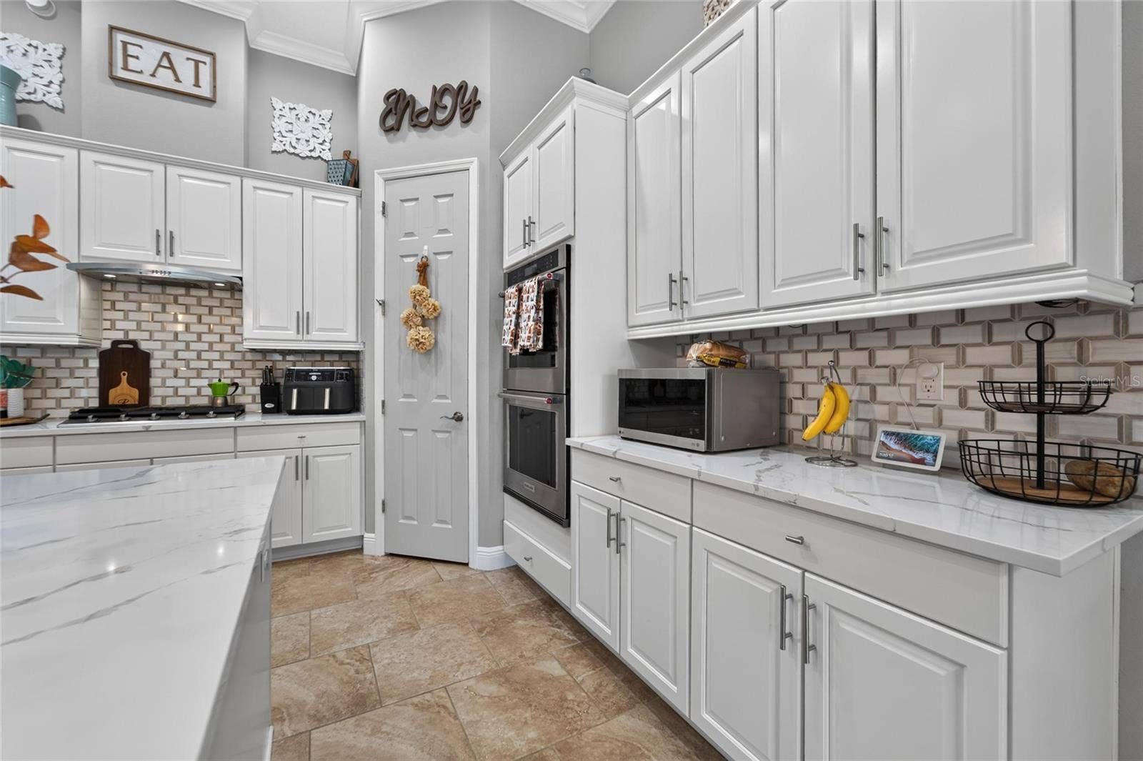 7007 COVINGTON STONE AVENUE, Apollo Beach, FL 33572 7007 COVINGTON STONE AVENUE, Apollo Beach, FL 33572