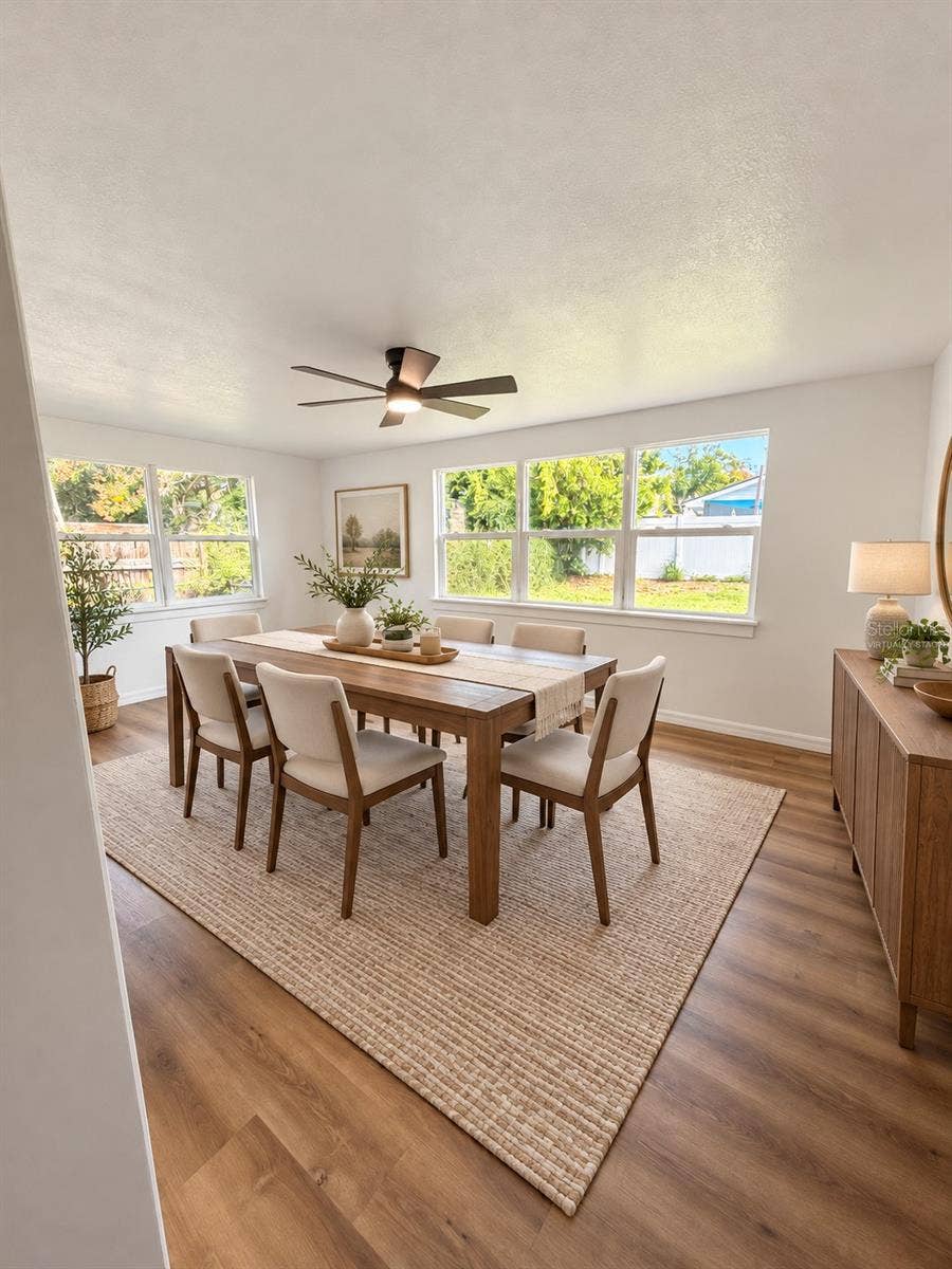 120 HAWTHORNE ROAD, Winter Haven, FL 33884 Virtually staged dining room highlighting the space's potential for everyday dining and entertaining.