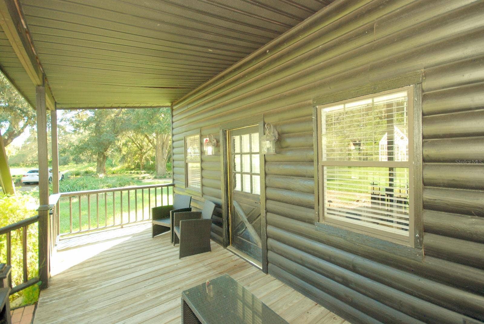 13022 E WHEELER ROAD, Dover, FL 33527 CABIN FRONT PORCH