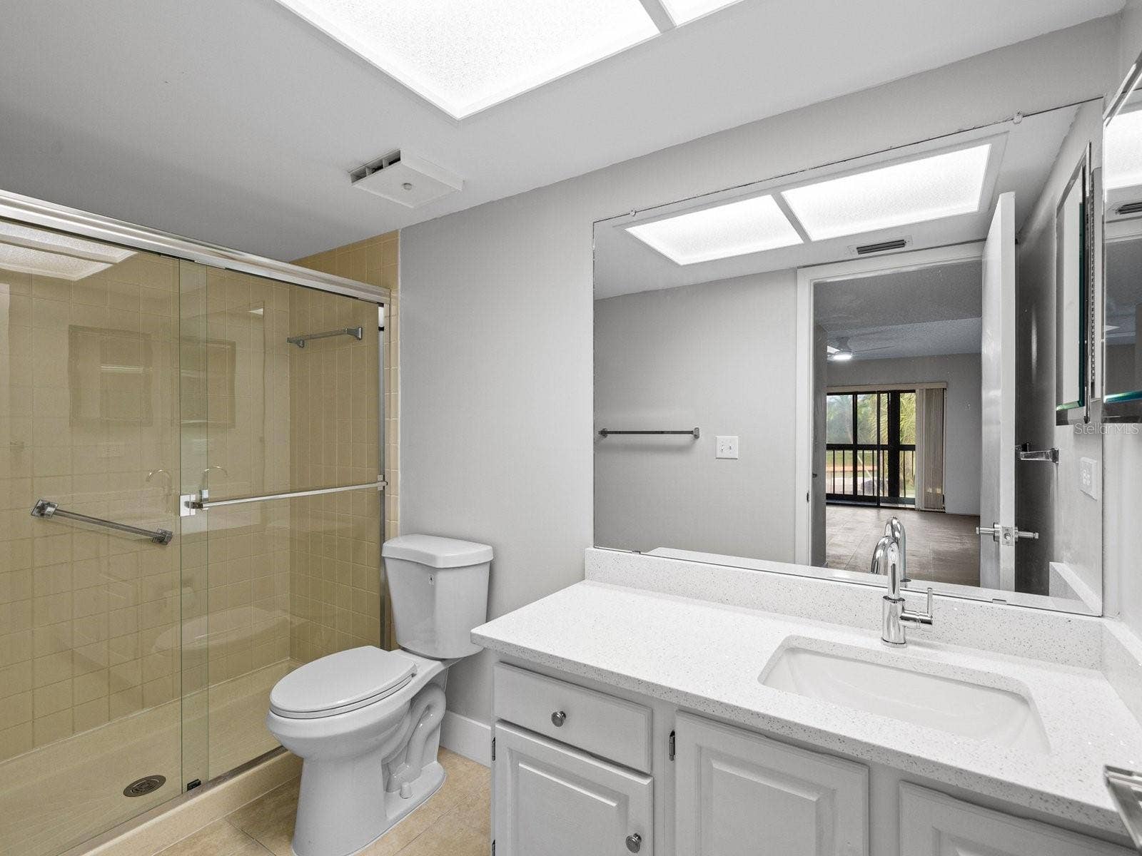 Step in primary shower with glass doors