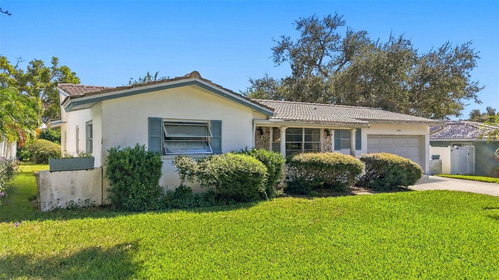 12266 69TH TERRACE, Seminole, FL 33772 Side view of home