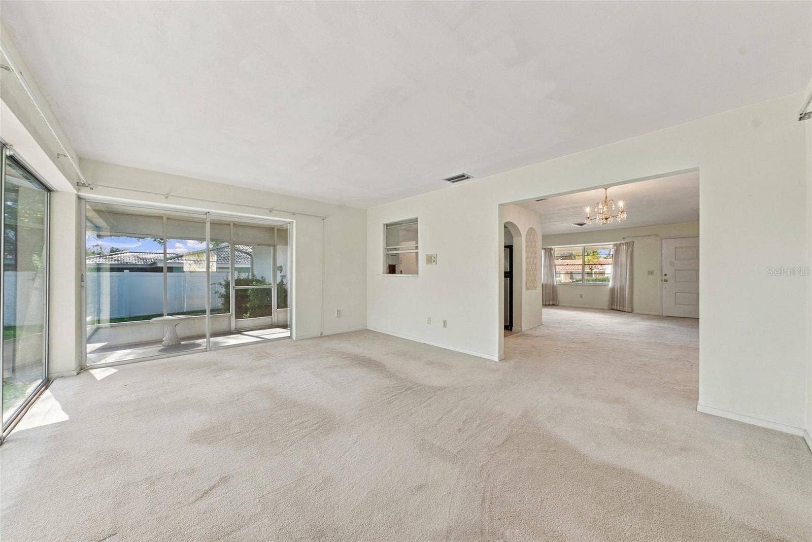 12266 69TH TERRACE, Seminole, FL 33772 Bright, open sunroom that can be turned into a second living room space