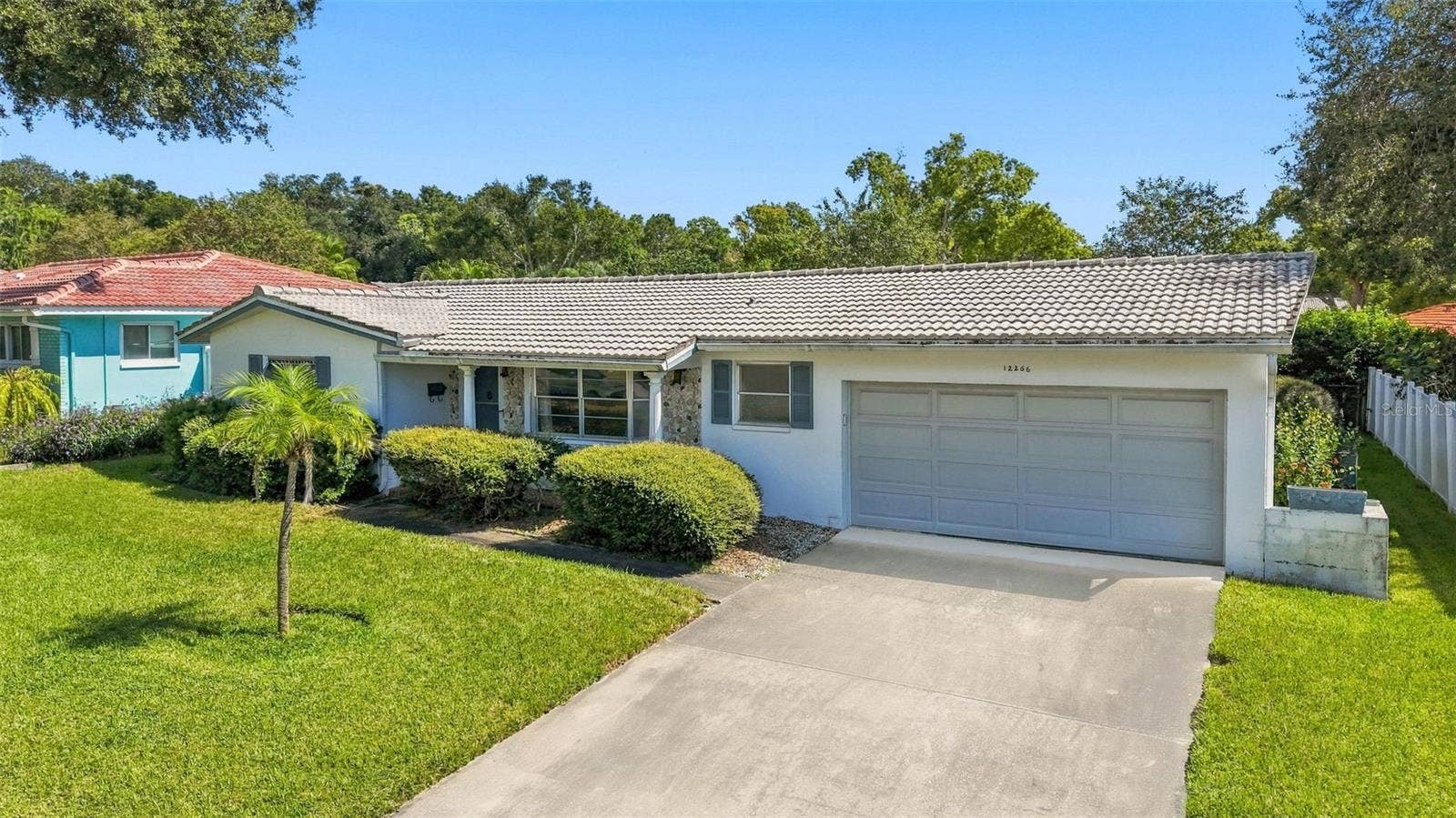 12266 69TH TERRACE, Seminole, FL 33772 Side view of the home