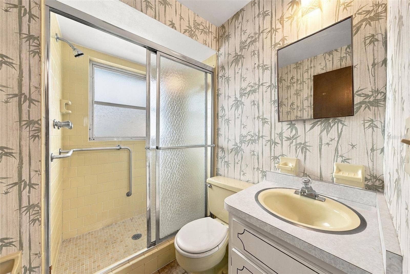 12266 69TH TERRACE, Seminole, FL 33772 Bathroom 2 features walk in-shower