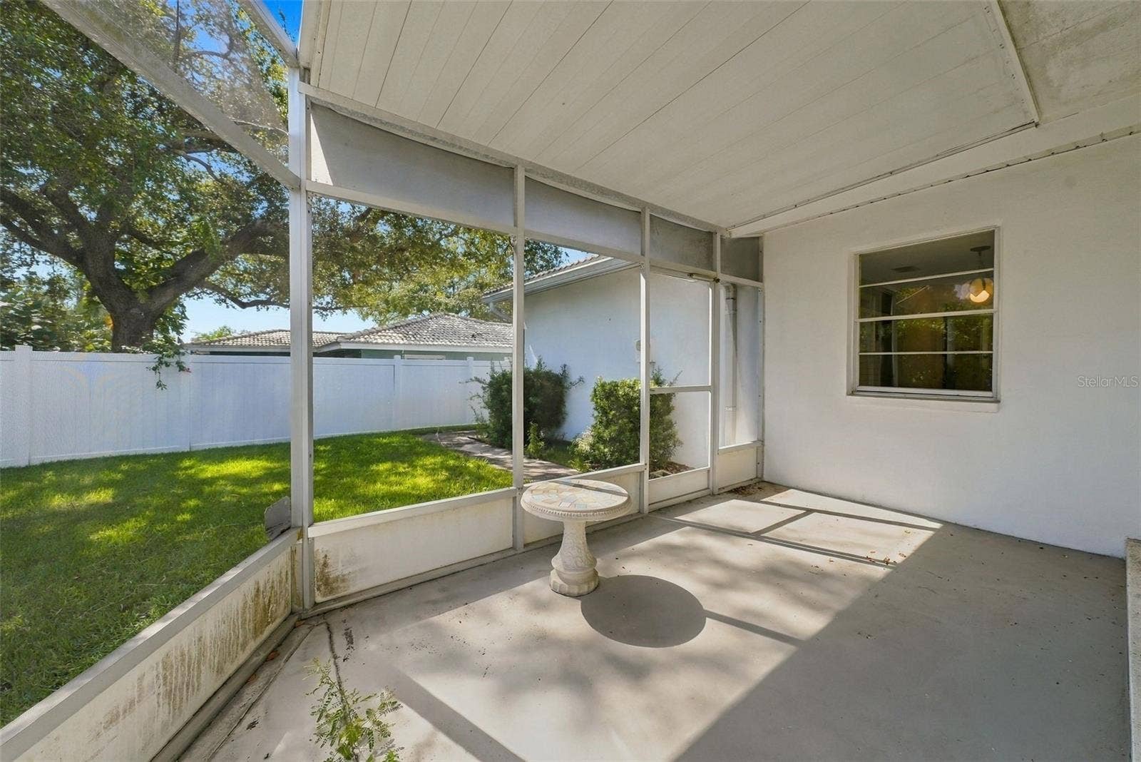 12266 69TH TERRACE, Seminole, FL 33772 Alternate view facing yard of the screened in porch