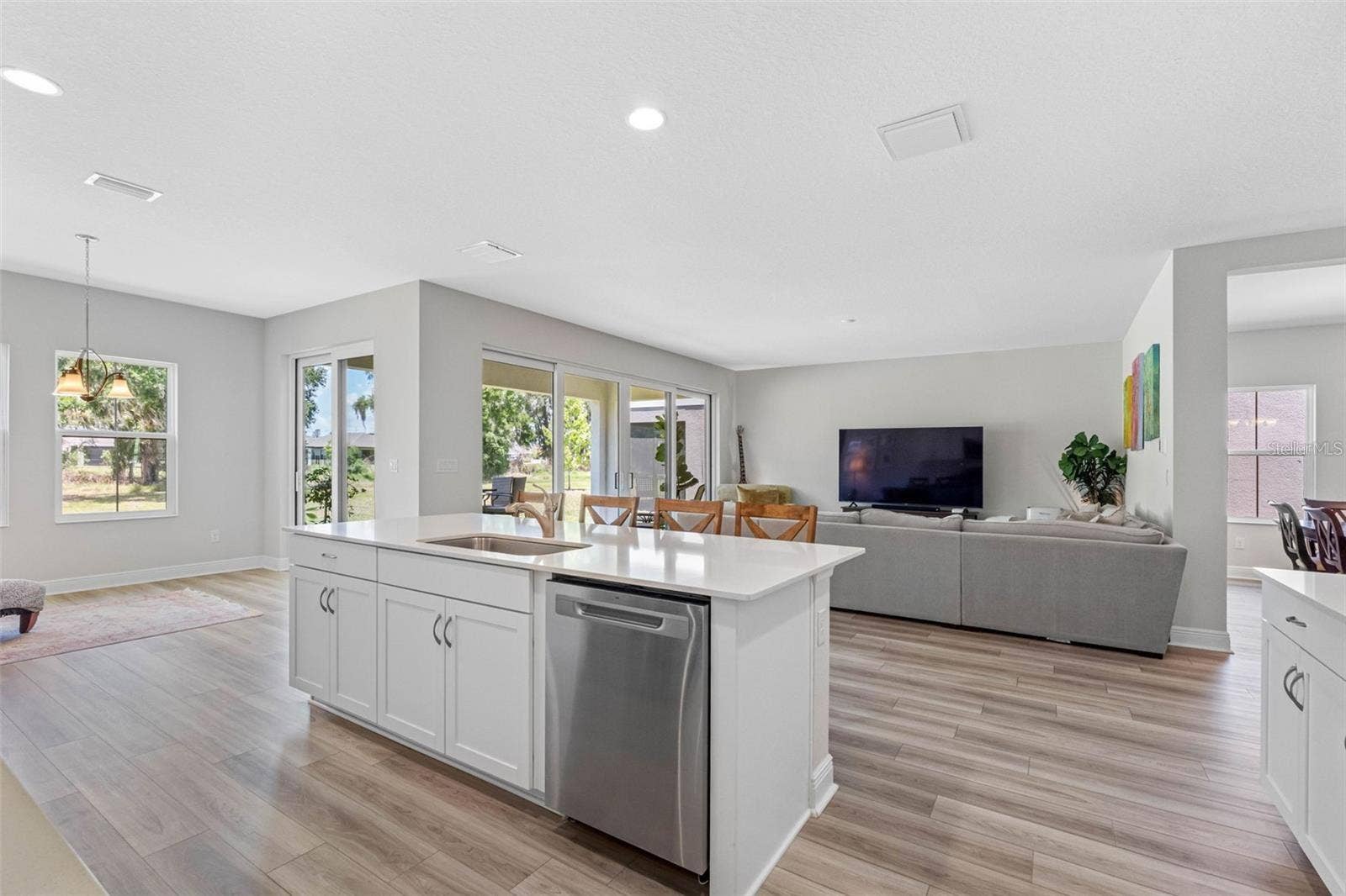 14868 SUMMER BRANCH DRIVE, Lithia, FL 33547 Large island with storage, opening to the cafe and backyard