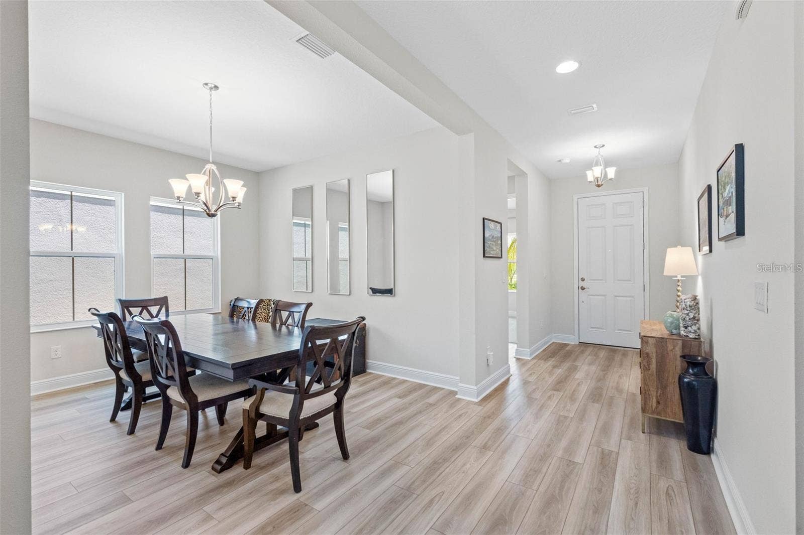 14868 SUMMER BRANCH DRIVE, Lithia, FL 33547 Formal dining room and welcoming foyer with luxury vinyl plank floors