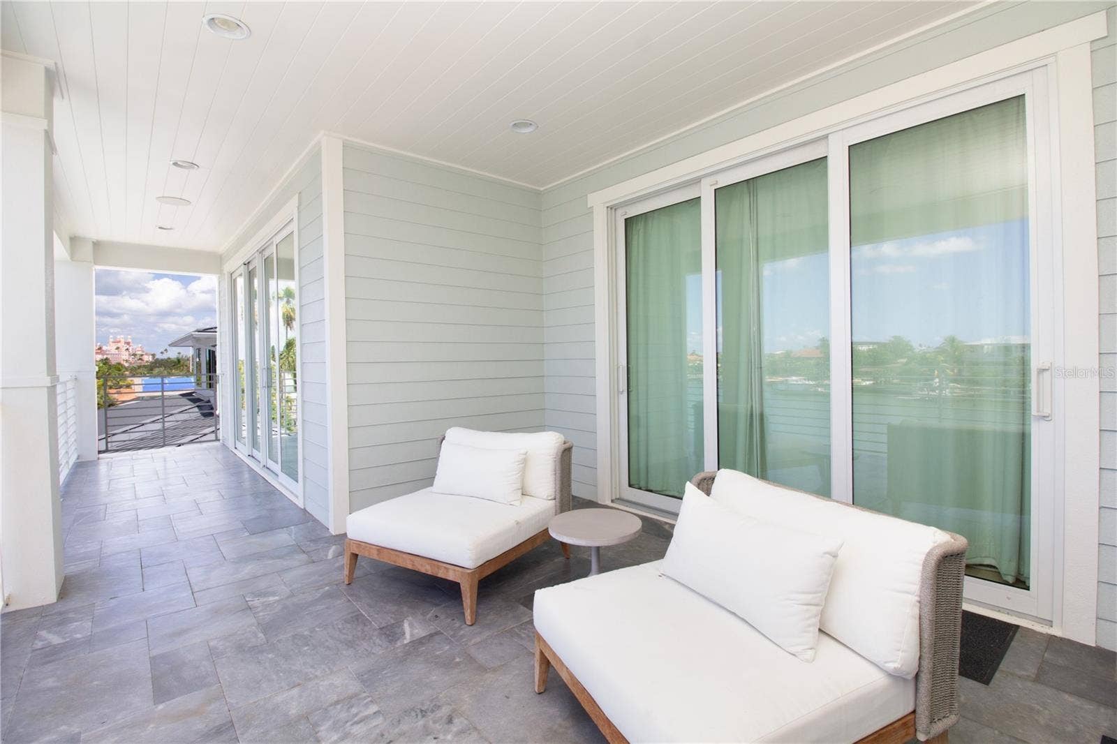 271 S JULIA CIRCLE, St Pete Beach, FL 33706 Outdoor Sitting Area Off of Primary, Second & Third Bedrooms