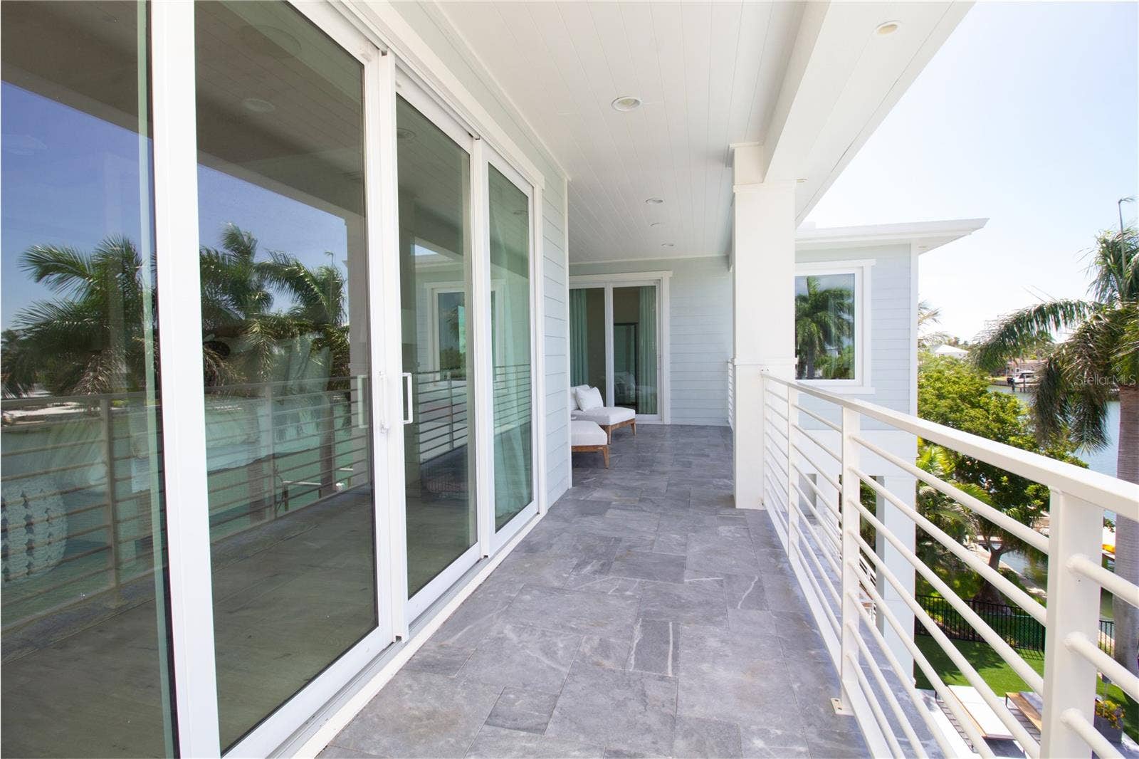 271 S JULIA CIRCLE, St Pete Beach, FL 33706 Outdoor Sitting Area Off of Primary, Second & Third Bedrooms