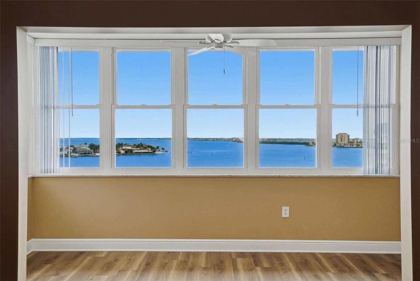 All impact windows with panoramic water views.
