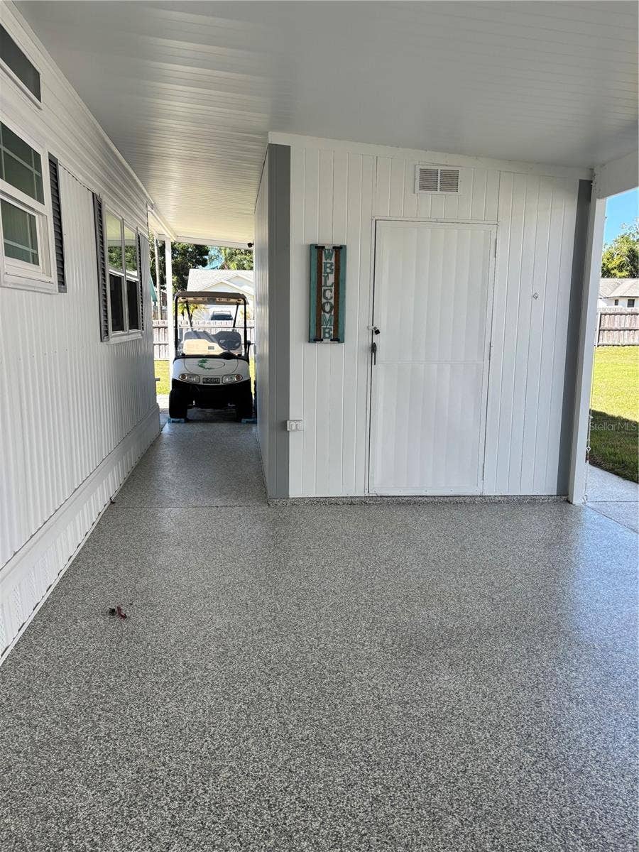 20 MOUNTAIN LAUREL DRIVE, Palm Harbor, FL 34684 Carport....utility closet
