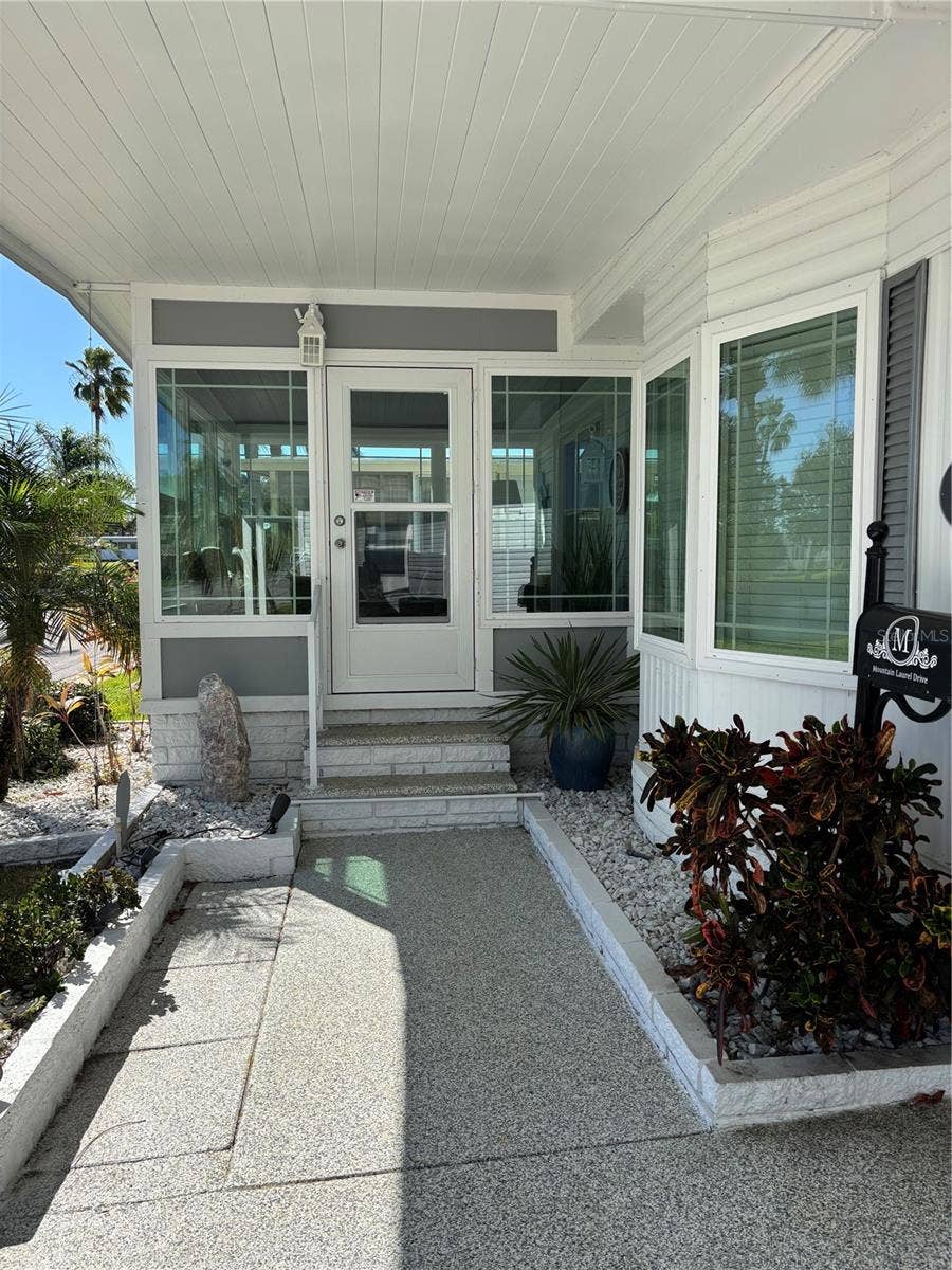 20 MOUNTAIN LAUREL DRIVE, Palm Harbor, FL 34684 Front entrance and porch