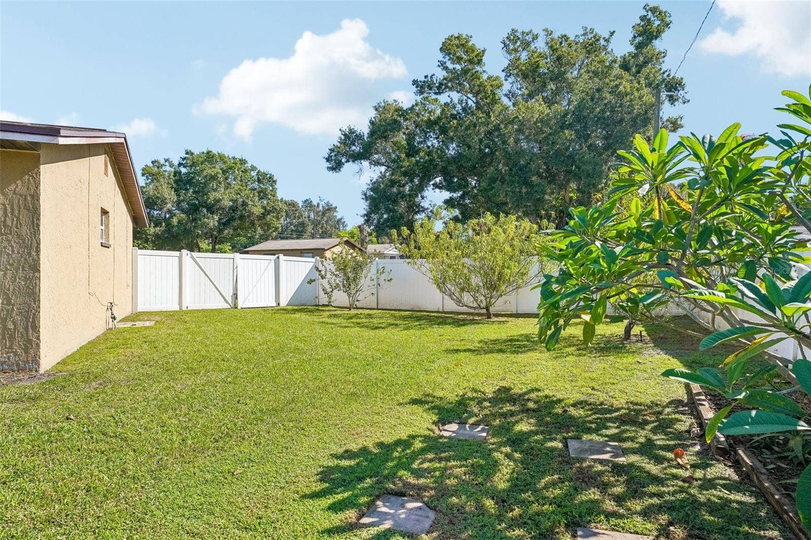 4100 45TH AVENUE N, St Petersburg, FL 33714 Perfect for RV or boat enthusiasts! The property features a convenient double-wide entry gate, offering easy access and the added benefit of storing your RV or boat right on your own propertyeliminating the hassle and expense of off-site storage while keeping your recreational vehicles close by and ready for your next adventure!