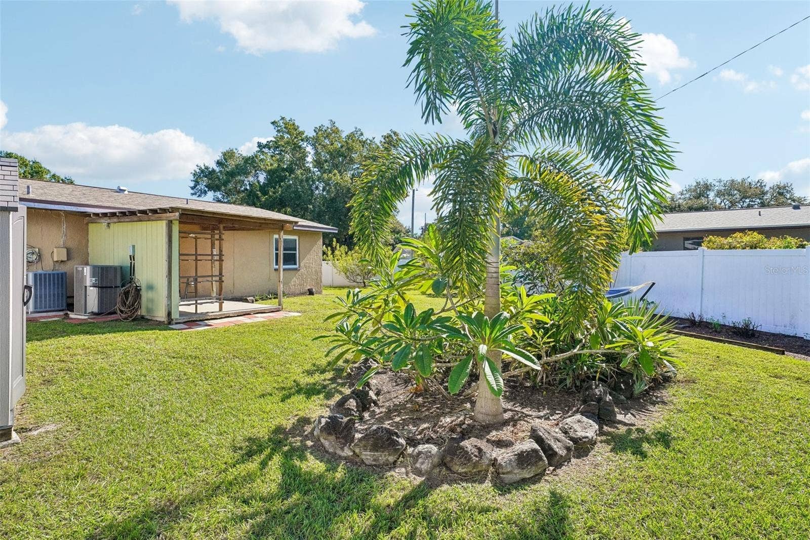 4100 45TH AVENUE N, St Petersburg, FL 33714 pretty landscaping with privacy fence.