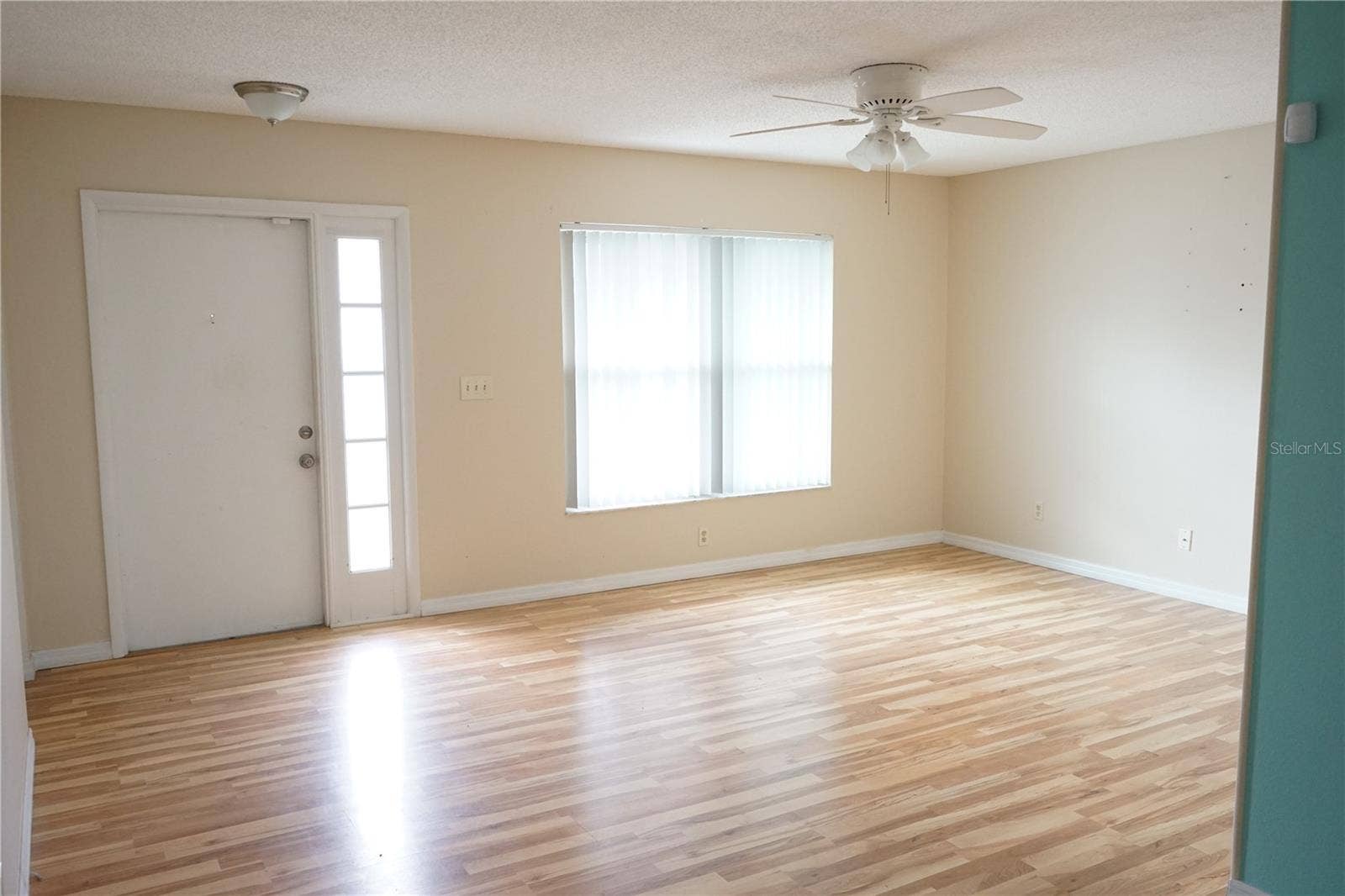 703 HUXLEY PLACE, Sun City Center, FL 33573 front door and living room