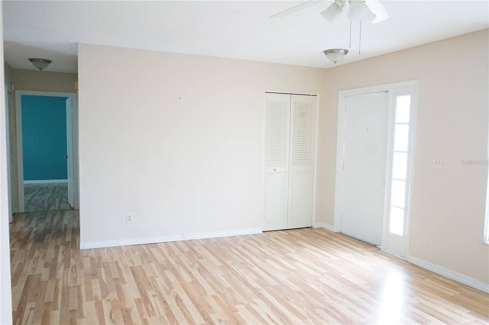 703 HUXLEY PLACE, Sun City Center, FL 33573 front door and coat closet