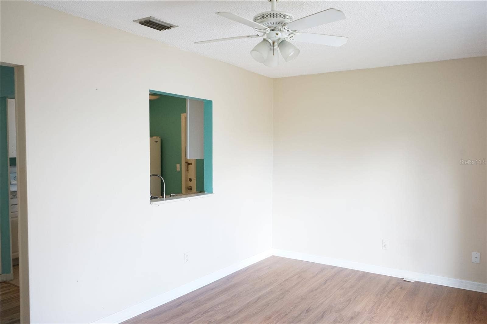 703 HUXLEY PLACE, Sun City Center, FL 33573 family has pass thru to kitchen